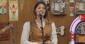 <p><a href="https://www.youtube.com/watch?v=rM9qyaeAlHQ">In this clip</a> from Larry&rsquo;s Country Diner, we start off by watching Hannah Miller, Dan Miller&rsquo;s daughter, playing the fiddle. Dan, Hannah, and Wendy Corr make up Dan Miller&rsquo;s Cowboy Music Revue. They are singing a cover of Suzy Bigguss&rsquo; hit song, &lsquo;Aces.&rsquo;</p>

<p>Hannah starts with the vocals and her voice is mesmerizing. Dan and Wendy join in to make for a beautiful performance.&nbsp;</p>

<p>Dan Miller&rsquo;s Cowboy Music Revue <a href="https://cowboymusicrevue.com/blog/about/">has been performing</a> around the world for 19 years. In addition to Larry&rsquo;s Country Diner, they have also been featured on the Travel Channel, ESPN, and the Great American Country Network.&nbsp;</p>

<p>After college, Dan went to LA to pursue his dreams. He found jobs in acting, radio, and television and that led to performing on stage in places like Reno and Lake Tahoe. He moved to Nashville to pursue a recording career.&nbsp;</p>

<p>When he and his family moved to Cody, WY, he continued to host television shows. Fellow musicians from Nashville started to come and perform as part of Dan&rsquo;s &ldquo;Cody Wild West Shows.&rdquo;</p>

<p>Hannah started performing on stage with her Dad at the age of six. She started to play the fiddle at the age of nine and later added her harmony vocals and became a full-fledged member of the band as well as adding in the mandolin.&nbsp;</p>

<p>Wendy joined the band in 2008 as a bass player and harmony vocalist. She had performed in community theater productions and sang for local events.&nbsp;</p>

<p><a href="https://larryscountrydiner.com/about/">Larry&rsquo;s Country Diner is</a> &ldquo;the wholesome, down-home, nationally-broadcasted variety show known for its spontaneity, impromptu dialogue and live-to-tape performances by the best country music artists of yesterday and today.&rdquo;</p>

<p>The performance by Dan Miller&rsquo;s Cowboy Music Revue is an example of the amazing talent you can find on Larry&rsquo;s Country Diner.&nbsp;</p>

<p><em>&ldquo;My lips shall greatly rejoice when I sing to you; and my soul, which you have redeemed.&rdquo; - <a href="https://www.godtube.com/bible/psalms/71-23">Psalms 71:23</a></em></p>
