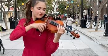 <p>This young woman is taking the world by storm with her creativity and high level of talent. Check out Karolina Protsenko&rsquo;s stunning violin cover of 80&rsquo;s hit, &lsquo;Livin&rsquo; On a Prayer&rsquo; by Bon Jovi.</p>

<p>Karolina has flair and poise as she does this classic song in the beautiful outdoor shopping center. A variety of people are watching her perform.&nbsp;</p>

<p>We see families with young children, elderly people, and even a construction worker who has stopped to listen in. The unique part of Karolina&rsquo;s performance is that she pairs her dancing skills with the violin. It is a true blend of the arts.</p>

<p>She hits stunningly high notes with flawless effort. You can see people come and throw money in the tip jar as you can tell this young woman has practiced and worked very hard to put on such an inspiring show.&nbsp;</p>

<p>As you listen, it appears to be so well done you would think someone much older and experienced would be playing at this level. However, God is the giver of gifts and talents, and He has provided for this girl to have such a beautiful love and natural ability with the violin.&nbsp;</p>

<p>This video reminds us of how the Lord has gifted us. We may not be prodigies, but we all have something that we love or are talented in to bring to the table. What is it that the Lord has entrusted to you to use as a blessing to others?</p>

<p>Karolina certainly blesses all of us with her bubbly personality, skilled violin playing, and beautiful dance.&nbsp;</p>

<p><em>&ldquo;Yet you, LORD, are our Father. We are the clay, you are the potter; we are all the work of your hand.&rdquo; <a href="https://www.godtube.com/bible/Isaiah/64-8">Isaiah 64:</a>8</em></p>
