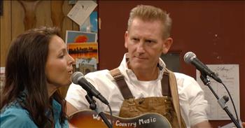 <p>Singer-songwriters and husband and wife Joey + Rory delivered a powerful and moving performance of the beloved hymn &ldquo;In the Garden&rdquo; on Larry&rsquo;s Country Diner.</p>

<p>Some songs, no matter how many times you hear them, will never become tired or old. Likely, it&rsquo;s because those lyrics and melodies have an added significance. They hold a special meaning or place in our hearts.&nbsp;</p>

<p>For a lot of people, a select number of hymns could never be heard or played too much. Immediately, the hymn that comes to mind is &ldquo;Amazing Grace.&rdquo; Yes, that is a beautiful hymn that has stood the test of time. It&rsquo;s been covered thousands of times by hundreds of artists.&nbsp;</p>

<p>But another hymn, a little less obvious but still just as beloved is &ldquo;In the Garden.&rdquo; It&rsquo;s a piece about spending quality time with the Lord, walking and talking with Him. Those precious moments with the Savior are enough to create an inexplicable joy, one that has never been known, the songwriter adds.&nbsp;</p>

<p>&ldquo;And he talks with me</p>

<p>And He tells me I am His own</p>

<p>And the joy we share as we tarry there</p>

<p>None other has ever known&rdquo;</p>

<p>Joey Feek, who sadly passed away in 2016 following a long battle with cancer, <a href="https://www.youtube.com/watch?v=8a-x9mp1sVA">delivered a magnificent country and bluegrass vocal performance.</a> Her husband, Rory, provides background vocals while also strumming along on the guitar.</p>

<p>Before the end of the clip, Joey invites the entire room to join her and sing along. It&rsquo;s a song that everyone is abundantly familiar with, as all jump in and lend their musical talents to the talented husband and wife team.&nbsp;</p>

<p>Right before the clip ends, the studio audience gives Joey and Rory Feek a well-deserved round of applause, showing their appreciation for their lovely and dazzling performance of a timeless classic, &ldquo;In the Garden.&rdquo;</p>

<p><em><a href="https://www.godtube.com/bible/philippians/4-7">Philippians 4:7</a> &ldquo;And the peace of God, which is deeper than all knowledge, will keep your hearts and minds in Christ Jesus.&rdquo;</em></p>
