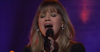 <p>The supremely talented and gifted Kelly Clarkson mesmerized with a breathtaking cover of a timeless and beloved tune, &ldquo;Over the Rainbow.&rdquo;</p>

<p>Many people want to be singers, playing to thousands of adoring fans every night. Just look at all the people who try out for shows like American Idol, America&rsquo;s Got Talent and The Voice. Everyone wants to believe they have what it takes to succeed in a highly competitive field like entertainment.</p>

<p>However, sadly, that&rsquo;s not the case at all. While many people may and do try out for those shows, the judges are the ones who have to crush those dreams as they gently let them down, telling them thanks but no thanks.&nbsp;</p>

<p>Kelly Clarkson was one of those people who tried out for those programs and most certainly has what it takes. She is the original American Idol. Since winning the first season of the popular singing competition show, she has become a household name due to her stunning voice. She has the ability and range to hit notes most other singers cannot.&nbsp;</p>

<p>In <a href="https://www.youtube.com/watch?v=XUp5K1_-1do">a clip posted on YouTube</a>, Kelly turned in a stunning performance of &ldquo;Over the Rainbow.&rdquo; It&rsquo;s a stripped-down, jazzy version. The focus is solely on Kelly&rsquo;s vocal performance, as it should be.&nbsp;</p>

<p>&ldquo;Someday, I&rsquo;ll wish upon a star</p>

<p>Wake up where the clouds are far behind me</p>

<p>Where trouble melts like lemon drops</p>

<p>High above the chimney tops, that&rsquo;s where&rdquo;</p>

<p>Because of her voice, Kelly can nail classic, beloved songs that others would not even think of trying. There is likely little that Kelly cannot sing or cover and make sound as good as and even better than the original.&nbsp;</p>

<p>Her version of &ldquo;Somewhere Over the Rainbow&rdquo; hits all the right notes, making it worth listening to repeatedly.&nbsp;</p>

<p><em><strong><a href="https://www.godtube.com/bible/colossians/3-16">Colossians 3:16</a></strong> &ldquo;Let the word of Christ dwell in you richly in all wisdom; teaching and admonishing one another in psalms and hymns and spiritual songs, singing with grace in your hearts to the Lord.&rdquo;</em></p>
