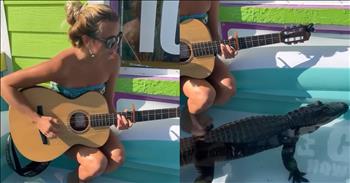 Woman Serenades Alligator With 'Islands In The Stream' By Dolly Parton And Kenny Rogers