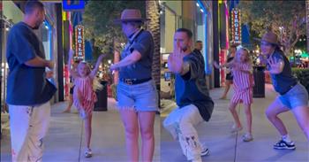 <p>In a scene straight out of a Kung Fu flick, a groovy family trio turned the bustling streets into their own martial arts showdown and wowed the internet with their &ldquo;Kung Fu Fighting&rdquo; dance in Las Vegas. Jamming to the timeless beats of "Kung Fu Fighting&rdquo; with moves as sharp as a katana and energy that could rival a Shaolin monk, this husband, wife, and daughter brought their A-game to the neon-lit sidewalks as their stage.</p>

<p>As the iconic <a href="https://www.instagram.com/reel/C6EuExoK6hD/">rhythm</a> filled the air, the husband unleashed his inner Bruce Lee, throwing punches and kicks with the precision of a seasoned warrior. With each step, he danced circles around his opponents, proving that he was indeed a black belt in the art of dance.</p>

<p>Not to be outdone, the wife channeled her inner Jackie Chan, seamlessly blending grace and power as she twirled and kicked with finesse. Her fluid movements drew admiring glances from onlookers, who couldn't help but marvel at her mastery of the dance and how much fun she was having!</p>

<p>And let's not forget the youngest member of the troupe, their daughter, whose pint-sized stature belied her formidable skills. With a gleam in her eye and a spring in her step, she danced circles around her parents, proving that when it comes to Kung Fu dancing, age is just a number.</p>

<p>Together, this dynamic family trio transformed the sidewalk into their own dojo, their synchronized moves a testament to their unity and bond. Passersby couldn't help but stop and stare, captivated by the spectacle unfolding before their eyes. This family was having so much fun!</p>

<p>As the music reached its crescendo, the trio struck their final poses, their fists raised triumphantly in the air. And as quickly as they had appeared, the family trio vanished into the sea of neon lights, leaving behind a trail of smiles and memories that would last a lifetime.&nbsp;</p>

<p><em><strong><a href="https://www.godtube.com/bible/ecclesiastes/3-4">Ecclesiastes 3:4</a></strong> "A time to weep, and a time to laugh; a time to mourn, and a time to dance."</em></p>
