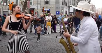 <p>This is a classic song with a brand-new spin, that you won&rsquo;t want to miss. This duo&rsquo;s marvelous violin and saxophone &ldquo;Stand by Me&rdquo; cover will leave you mesmerized.</p>

<p>Karolina Protsenko is taking the global internet by storm as a combination dancer and violinist. In this video, we see her partnered with saxophonist, Daniele Vitale, performing on the streets of a beautiful shopping center in California together. Karolina plays the violin and Daniele plays the saxophone.</p>

<p>A large crowd is gathered around the two, watching their stunning performance, live. Karolina begins with a beautiful solo of the verse. She always plays with such flair. The saxophone then starts with the response. Daniele is an incredible musician with a positive attitude.</p>

<p>The two play together with such exquisite musical talent. The large crowd is amazed. Karolina and Daniele have such energy and excitement over the song they are performing. Vitale is even wearing a fedora. During the bridge, Vitale leads a clap with the crowd as Karolina begins to dance with her violin, hitting the high notes flawlessly. These two have a great chemistry. These two appear to genuinely enjoy performing together and seem to have a lot of fun. We even see a precious little girl with her dad coming over to put some money in their case. These two put on an amazing performance that is enjoyable for all ages.</p>

<p>&ldquo;Stand by Me&rdquo; is all about loyalty. God teaches us the blessing of working with others. We were created to be in a community. There is great joy in having brothers and sisters in Christ.&nbsp;</p>

<p><em>&ldquo;I long to see you so that I may impart to you some spiritual gift to make you strong&mdash; that is, that you and I may be mutually encouraged by each other&rsquo;s faith.&rdquo; <strong><a href="https://www.godtube.com/bible/Romans/1-11">Romans 1:11-12</a></strong></em></p>
