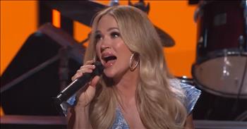 <p>In a stirring tribute to the late country music legend Toby Keith, Opry star Carrie Underwood captivated audiences with her breathtaking rendition of "Should've Been A Cowboy" during her recent performance at the Grand Ole Opry.</p>

<p>&nbsp;Dressed in a delicate gown adorned with sparkles of blue and white, Carrie took the stage with grace and poise, channeling the spirit of Keith's iconic hit from 1993. As her angelic voice filled the hallowed halls of the Opry, it was as if time stood still, transporting listeners back to a simpler era of country music.&nbsp;</p>

<p>Her voice carried us back to 1993 as she sang these words:</p>

<p>&lsquo;I should've been a cowboy.&nbsp;</p>

<p>I should've learned to rope and ride,</p>

<p>I'd be wearin' my six-shooter ridin' my pony on a cattle drive.&nbsp;</p>

<p>Stealin' the young girls' hearts just like Gene and Roy,&nbsp;</p>

<p>Singin' those campfire songs,&nbsp;</p>

<p>Woah, I should've been a cowboy&rsquo;</p>

<p>You could almost see the image of Toby singing those famous words from his song.&nbsp;</p>

<p>With each note, Carrie paid homage to Toby Keith's timeless legacy, infusing the song with her own unique blend of passion and reverence. From the twang of the guitar strings to the heartfelt lyrics that resonated with audiences old and new, Carrie's performance was a heartfelt tribute to a country music icon whose influence continues to shape the genre to this day.&nbsp;</p>

<p>&lsquo;I might of had a sidekick with a funny name</p>

<p>Runnin' wild through the hills chasin' Jesse James</p>

<p>Ending up on the brink of danger</p>

<p>Ridin' shotgun for the Texas Rangers&rsquo;</p>

<p>As the final chords of Carrie Underwood's performance faded into the night, a profound sense of unity and inspiration filled the famous Grand Ol&rsquo; Opry. The memory of Toby Keith's enduring legacy was etched into the hearts of all who were fortunate enough to witness this unforgettable moment. Carrie's mesmerizing and beautiful performance served as a powerful reminder of the unifying and inspiring power of music and its ability to honor those who have paved the way for future generations.</p>

<p>&nbsp;In a world often marked by chaos and uncertainty, it is moments like these that remind us of the beauty and the magic of country music and the indelible impact it has on our lives.</p>

<p><em><strong><a href="https://www.godtube.com/bible/psalms/150-6">Psalm 150:6</a></strong> "Let everything that has breath praise the Lord. Praise the Lord."</em></p>
