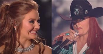 <p>Watch this moving performance of &lsquo;Coal Miner&rsquo;s Daughter&rsquo; on American Idol from Wynonna Judd and Emmy Russell.</p>

<p>&lsquo;Well, I was borned a coal miner's daughter</p>

<p>In a cabin, on a hill in Butcher Holler</p>

<p>We were poor but we had love</p>

<p>That's the one thing that daddy made sure of&rsquo;</p>

<p>What a beautiful performance from Wynonna Judd and Emmy Russell! Emmy is a 25-year-old singer who is the granddaughter of late country legend Loretta Lynn. She made it to the top five on this season of American Idol before getting eliminated.</p>

<p>"I didn't make top three, but that was God's plan," Emmy <a href="https://www.today.com/popculture/tv/loretta-lynn-granddaughter-emmy-russell-american-idol-rcna147802">shared</a> in a video on Instagram. "It's funny because before I got eliminated, I really felt like I think God told me, he was like, 'Emmy, you're not going to be chosen by America, but I chose you.' And so there was no sense of, 'Why wasn't I chosen?' I know I'm chosen.&rdquo;</p>

<p>She continued: "And so for me, the point of being here is you can be yourself and be successful. Don't run from rejection of pain and facing hard things."</p>

<p>In a beautiful tribute moment, Emmy was able to sing her grandmother's song &lsquo;Coal Miner&rsquo;s Daughter&rsquo; on the American Idol Grand Finale with Wynonna Judd. Emmy sings the first verse, Wynonna sings the second, and then in a sweet gesture, Wynonna reaches out her hand to hold onto Emmy&rsquo;s hand.</p>

<p>&ldquo;I hear Loretta in her granddaughter's voice and see her in her face. Loretta would be so proud! RIP Loretta, you're a national treasure!&rdquo; <a href="https://www.youtube.com/watch?v=SIImqJVrJ5A">comments</a> one person on YouTube.</p>

<p>&ldquo;Beautiful voice Emmy&hellip;your grandmother is smiling proudly from Heaven, and Wynonna, you still have the strongest, most amazing voice in country music!&rdquo; <a href="https://www.youtube.com/watch?v=SIImqJVrJ5A">writes</a> another person online.</p>

<p>After singing &lsquo;Coal Miner&rsquo;s Daughter,&rsquo; the pair go on to sing &lsquo;No One Else on Earth&rsquo; by Wynonna Judd. The whole performance was just wonderful to watch!</p>
