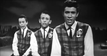 <p>Check out this clip of the Bee Gees&mdash;younger than most of us remember&mdash;as they sing Bob Dylan&rsquo;s 1962 Classic &ldquo;Blowin&rsquo; in the Wind.&rdquo;&nbsp;&nbsp;</p>

<p>For many, when we think of the Bee Gees, <a href="https://www.imdb.com/title/tt6863794/">we recall the video</a> of the three long-haired and necklaced brothers strutting through the streets of a deserted and dilapidated city. They&rsquo;re singing &lsquo;Staying Alive.&rsquo; Barry&rsquo;s full, fluffy hair blows in the breeze. Maurice wears a broad-collared shirt with the first few buttons undone, and twin Robin wears a black vest over an orange t-shirt. That&rsquo;s the video we remember!</p>

<p>This one goes a little further back. While the familiar video was filmed in 1977, this clip is from an appearance that The BG&rsquo;s made on Australian television on August 19, 1963! Born on the <a href="https://en.wikipedia.org/wiki/Barry_Gibb">British Island Territory</a> of Isle of Man, the family moved to Australia in 1958. Here, Barry was 16 years old, and his brothers were 13. Even at those young ages, their talent was evident</p>

<p>Robin sits at the rear, Maurice is in the middle, and Barry sits in front. The three are dressed in slacks, dress shirts, ties, and plaid vests. They wear BG pins on their chests. Originally, they were simply <a href="https://www.beegees.com/1543-2/">The BG&rsquo;s</a>, representative of Barry&rsquo;s initials as well as two other friends, Bill Goode and Bill Gates. Later, the name evolved into the Bee Gees, as in the Brothers Gibb.&nbsp;&nbsp;&nbsp;</p>

<p>It really is fun to watch the young brothers. The age difference between Barry and his siblings seems significant at this stage of life, though it is only three years. Maurice seems to be the more serious of the twins, and Robin is more expressive. Their three voices blend perfectly!&nbsp;</p>

<p>There are over 800 comments regarding the video. Many people remark on the beautiful harmonies they produce. Several note Robin&rsquo;s charisma and personality. And a great number expressed their sadness and sympathy for Mrs. Barbara Gibb; <a href="https://www.thewrap.com/surviving-bee-gee-barry-gibb-says-hed-rather-have-his-brothers-back-here-and-no-hits-at-all/">she outlived three of her four sons</a>. Maurice, Robin, and Andy, the youngest of the Gibb brothers, died at the ages of 53, 62, and 30, respectively. Barry is now 77 and has been married to wife <a href="https://www.smoothradio.com/artists/barry-gibb/marriage-wife-linda/">Linda Gray for nearly</a> 54 years.</p>

<p>None of us know where life will lead, and surely, the Bee Gees had no idea where their lives would take them when they covered Bob Dylan&rsquo;s song all those years ago. The Brothers Gibb went on to sell nearly <a href="https://www.thecoast.net.nz/trending-now/pre-fame-bee-gees-perform-harmonious-cover-of-bob-dylans-iconic-blowin-in-the-wind/">220 million records and win 10 Grammy Awards</a>. We are blessed because that single song is just one of so many wonderful musical moments the group gave the world!</p>

<p><em>&ldquo;Don&rsquo;t let anyone look down on you because you are young, but set an example for the believers in speech, in conduct, in love, in faith and in purity.&rdquo; <strong><a href="https://www.godtube.com/bible/1-timothy/4-12">1 Timothy 4:12</a></strong></em></p>
