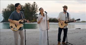 <p>Transport yourself to paradise with Music Travel Love and Marsha Milan's enchanting cover of &lsquo;Islands In the Stream.&rsquo; Set against the backdrop of breathtaking islands and the gentle rhythm of ocean waves, the video is a visual feast for the senses. As the trio stands on the sandy shores with microphones and guitars in hand, their harmonious voices blend seamlessly, creating a melody that sweeps you off your feet.</p>

<p>Originally <a href="https://www.youtube.com/watch?v=HQW7I62TNOw&amp;ab_channel=paradiseresort">performed</a> by Dolly Parton and Kenny Rogers, &lsquo;Islands In the Stream&rsquo; takes on new life in the hands of <a href="https://www.youtube.com/watch?v=tMJrQRJFNoA&amp;ab_channel=MusicTravelLove">Music Travel Love and Marsha Milan</a>. Their rendition infuses the timeless classic with a fresh, contemporary twist, capturing the essence of love and romance against the backdrop of sun-kissed beaches and crystal-clear waters.</p>

<p>&lsquo;Islands in the stream</p>

<p>That is what we are</p>

<p>No one in between</p>

<p>How can we be wrong?&rsquo;</p>

<p>With each note, the song evokes a sense of nostalgia and longing, making you yearn for lazy days spent lounging on the sand, hand in hand with your loved ones. It's the kind of music that transports you to a place of blissful serenity, where worries melt away, and all that matters is the beauty of the moment.</p>

<p>&lsquo;Sail away with me</p>

<p>To another world</p>

<p>And we rely on each other, ah ha</p>

<p>From one lover to another, ah ha&rsquo;</p>

<p>From the harmonious vocals to the mesmerizing scenery, every aspect of the video is designed to captivate and enchant. Whether you're watching it for the first time or hitting replay for the hundredth, there's something undeniably irresistible about Music Travel Love and Marsha Milan's cover of &lsquo;Islands In the Stream.&rsquo; You can&rsquo;t help but hit replay on this beautiful and moving rendition.&nbsp;</p>

<p>So grab your favorite beach clothes, take your loved ones by the hand, and let the music carry you to a world of sun, sand, and sea. With this trio as your guide, you're in for a journey you won't soon forget.</p>

<p><em><strong><a href="https://www.godtube.com/bible/colossians/3-16">Colossians 3:16</a></strong> "Let the message of Christ dwell among you richly as you teach and admonish one another with all wisdom through psalms, hymns, and songs from the Spirit, singing to God with gratitude in your hearts."</em></p>
