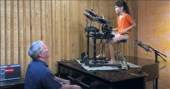 <p>This is a must-see video! Check out as father-daughter duo rocks &lsquo;Johnny B. Goode&rsquo; with a fantastic cover.</p>

<p>This is a timeless classic rock song. At the start of the video, we see a young girl with a drum set sitting on top of a baby grand piano. Her father is at the keys. He begins to play, and she accompanies him. The duo is really talented. They hit all of their notes and stayed on the beat of this challenging song.&nbsp;</p>

<p>The two hold such composure. They play relaxed and steady. You can see as they record the song in the background on the laptop. They have worked hard to create this performance. Their staccato hits are amazing, as every beat sings out. The daughter stays focused and poised. She hits all of her cues, and her dad does amazing work running up and down the piano. Johnny B. Goode was initially composed by Chuck Berry in 1958. The song has lyrics, even though this video is an instrumental version. The words reveal that Johnny B. Goode is about a boy from Louisiana who cannot read but can play the guitar.&nbsp;</p>

<p>The chorus sings:</p>

<p>&lsquo;Go Johnny, go, go</p>

<p>Johnny B. Goode&rsquo;</p>

<p>This song is upbeat and hopeful that everyone has skills, they just need to sharpen them. I love how this father and daughter are living out the message of the song. They are playing their instruments and growing as musicians on the piano and drums. They adorably encourage one another with a fist bump at the end of the song.&nbsp;</p>

<p>It is very special when a family can share in a skill together and witnessing this dad and daughter reminds us of the gift of enjoying music with others. God created music to express emotions. The Psalms use music to share feelings and life situations. Whether it is celebration or sorrow, we can go to God today.</p>

<p><em>&ldquo;Praise the Lord, my soul; all my inmost being, praise his holy name. Praise the Lord, my soul, and forget not all his benefits&mdash;&rdquo; <strong><a href="https://www.godtube.com/bible/Psalms/103-1">Psalm 103:1-2</a></strong></em></p>
