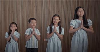 <p>In a heartwarming display of faith and family, siblings from the Asidor family perform an emotional rendition of &lsquo;Give Thanks.&rsquo; This Christian family from the Philippines has been sharing God's love and the gospel through their music since <a href="https://www.crosswalk.com/culture/music/year-old-sings-amazing-grace-my-chains-are-gone.html">1996</a>, traveling across the country to perform at churches, Christian gatherings, crusades, and various events.</p>

<p>The Asidor family's passion for worship is deeply rooted in a <a href="https://www.crosswalk.com/culture/music/year-old-sings-amazing-grace-my-chains-are-gone.html">vision</a> experienced by their father, M. Asidor Sr., during his teenage years. He dreamt of angels singing in heaven, and those angels turned out to be his own children.&nbsp;</p>

<p>Their rendition of &lsquo;<a href="https://www.youtube.com/watch?v=w00O7hdGOsM&amp;ab_channel=TheAsidorSHome">Give Thanks</a>&rsquo; is a touching reminder of the power of gratitude and faith. As the siblings, three young girls and one boy, sing the powerful lyrics:</p>

<p>&lsquo;Give thanks with a grateful heart</p>

<p>Give thanks to the Holy One</p>

<p>Give thanks because He's given</p>

<p>Jesus Christ His Son&rsquo;</p>

<p>Their harmonies resonate with the depth of their devotion. The chorus, filled with hope and assurance, echoes their belief in God's providence:</p>

<p>&lsquo;And now let the weak say I am strong</p>

<p>Let the poor say I am rich</p>

<p>Because of what the Lord has done for us</p>

<p>And now let the weak say I am strong</p>

<p>Let the poor say I am rich</p>

<p>Because of what the Lord has done for us&rsquo;</p>

<p>The Asidors' performance is more than just a musical act; it is a testimony of their unwavering faith and dedication to spreading the gospel. Their father&rsquo;s <a href="https://www.crosswalk.com/culture/music/year-old-sings-amazing-grace-my-chains-are-gone.html">dream</a> of angelic voices has come true, and through their singing, they bring a piece of heaven to earth.</p>

<p>The family's journey and shared mission have strengthened their faith and touched the hearts of many who have had the privilege of hearing them sing. The Asidors remind us of the importance of giving thanks and recognizing the blessings we have received, encouraging us to find strength and richness in God's love. We hope you enjoyed this delightful music video!</p>

<p><em><strong><a href="https://www.godtube.com/bible/1-thessalonians/5-18">1 Thessalonians 5:18</a></strong> "Give thanks in all circumstances; for this is God&rsquo;s will for you in Christ Jesus."</em></p>
