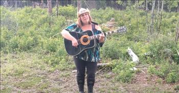 <p>In a serene forest setting, the notes of Fleetwood Mac&rsquo;s &lsquo;Landslide&rsquo; gets a beautiful cover by a talented woman. <a href="https://www.youtube.com/@IndigoSkookum">Indigo Skookum</a> stood among the trees, singing a heartfelt cover of Fleetwood Mac&rsquo;s &lsquo;Landslide.&rsquo; Dressed in black pants and a blue printed shirt and adorned with a cowgirl hat, she strummed her belated father&rsquo;s guitar. The birds chirped softly in the background, adding a natural symphony to her poignant performance.</p>

<p>This tribute was not just a song but a profound homage to her late father, a man who was more than just a father to her. The guitar, his cherished possession, symbolized their shared love for music. In a heartfelt caption, she shared the significance of the moment: &ldquo;When I miss my Dad, I play his guitar.&nbsp; He loved it when I sang this, but he never heard me play it. So yesterday, I sang it outside in my yard, with the birds for backup.&rdquo;</p>

<p>Each strum of the guitar, each note of her voice, resonated with the love and memories she held for him. The guitar, once her father&rsquo;s, carried not only the melody of the song but also the echoes of a cherished past. Her voice, filled with raw emotion and grace, flowed through the woods, touching the hearts of all who heard it, leaving an indelible mark on their souls.</p>

<p>As she sang, the lyrics of &lsquo;Landslide&rsquo; seemed to take on new meaning. The song's reflection on change and the passage of time mirrored her own journey of loss and remembrance. Standing there in the quiet beauty of the forest, she connected deeply with the words, allowing her grief to transform into a celebration of her father's life and legacy.</p>

<p>The forest, with its timeless beauty and tranquility, provided the perfect backdrop for this intimate moment. The birds&rsquo; gentle chirping seemed to harmonize with her voice, creating a moving blend of nature and music. It was as if the entire forest joined in her tribute, honoring the bond between father and daughter and reminding us of the eternal cycle of life and love.</p>

<p>In this touching scene, Indigo&rsquo;s performance of &lsquo;Landslide&rsquo; was more than just a song; it was a powerful act of love and remembrance. Her voice, the guitar, and the natural surroundings came together to create a moment of profound beauty and inspiration. Through her music, she not only honored her father's memory but also found a way to heal and celebrate the enduring impact of his life on hers. What a beautiful way to honor the late memory of her dad.&nbsp;</p>

<p><em><strong><a href="https://www.godtube.com/bible/psalms/34-18">Psalm 34:18</a></strong> "The Lord is close to the brokenhearted and saves those who are crushed in spirit."</em></p>

