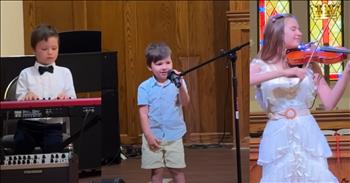 <p>An adorable 3-year-old turned in what is likely the cutest and most heartwarming rendition of the popular gospel tune, &ldquo;Goodness of God.&rdquo;</p>

<p>The Bible is essentially a blueprint and a guidebook for life. It has answers, commands and suggestions for every situation we&rsquo;ll encounter. There isn&rsquo;t an area of life that the Bible, at some point in its 66 books, doesn&rsquo;t mention or touch upon in some way.</p>

<p>One area in which the Bible has a lot to say is about parenting and raising children. Parents should treat their children with love and kindness and not in ways that will provoke them into anger. Mom and Dad are to raise their youngsters by instilling in them the knowledge, instruction and fear of the Lord. The Bible even mentions that parents who do this when their children are young will see the dividends and rewards later in the child&rsquo;s life.</p>

<p>A <a href="https://www.youtube.com/watch?v=cZwTz3MEmnM">clip posted on YouTube</a> shows a youngster and his siblings, who are obviously being raised in the church and being taught about the Lord. In the three-and-a-half-minute clip, the 3-year-old young man sings &ldquo;Goodness of God.&rdquo;</p>

<p>The little guy stands confidently at the lowered microphone and belts out the lyrics of the popular tune. It&rsquo;s one of the sweetest covers of that song that you will ever see anywhere. A young man singing a song about the Lord, His love, mercy and grace shows that some parents still raise their children correctly.</p>

<p>But 3-year-old Nicholas is not the only person on the stage demonstrating his musical talent. According to the video's description, he is joined by his older siblings&mdash;6-year-old Leo on the keyboard and his older sister Karolina, who beautifully plays the violin.&nbsp;</p>

<p>After the conclusion of the siblings&rsquo; lovely performance, the church, rightfully so, erupts in applause. One man can even be heard saying, &ldquo;Amen.&rdquo;</p>

<p><em><strong><a href="https://www.godtube.com/bible/proverbs/22-6">Proverbs 22:6</a></strong> &ldquo;If a child is trained up in the right way, even when he is old he will not be turned away from it.&rdquo;</em></p>
