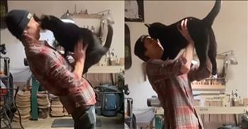Man and Cat Hilariously Recreate Iconic 'Dirty Dancing' Scene