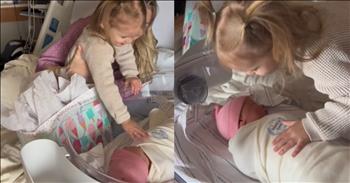 <p>In a scene of pure, unfiltered joy, a little girl meets her baby sister, and her reaction melts hearts from the heartwarming sweetness. The tiny girl races through the hospital corridors, her excitement palpable as she clutches a bag almost as large as herself. A special gift for her baby sister is inside the bag, wrapped with care&mdash;a gesture that embodies the pure love of a sibling&rsquo;s first meeting.</p>

<p>As she arrives at the hospital room, her anticipation is almost tangible. She drops her coat in a haphazard pile on the floor, unable to contain her excitement. With a burst of energy, she scrambles onto her mama&rsquo;s bed, her little legs kicking playfully. Nestled in her mother's arms, she stretches her neck and peers over with wide, wonder-filled eyes at the tiny bundle resting beside her. Instantly, the toddler is in love with her new baby sister.&nbsp;</p>

<p>She then decides it&rsquo;s time to give her sister a present. The toddler&rsquo;s eyes light up with unrestrained joy as she carefully opens the bag, with tissue flying, revealing a delicate pink princess dress. With a giggle that fills the room with warmth, she gently lays the dress over her newborn sister&rsquo;s face. The contrast between the soft fabric and the baby&rsquo;s serene expression creates a tender, funny moment that captures the essence of their budding bond.</p>

<p>Suddenly, she is overwhelmed with emotions and <a href="https://www.tiktok.com/@nicolecastonguayhogan/video/7375997838800506155">states</a>, &ldquo;I need to kiss her!&rdquo; Carefully, Mom and Dad help the toddler give her sister a peck on the cheek before finally getting a chance to hold her. The moment practically melts hearts as the clip captures Mom holding her toddler and her toddler holding her sister. What a beautiful moment!</p>

<p>This simple, endearing act symbolizes the beginning of a deep, lifelong connection between the two sisters. It&rsquo;s a touching glimpse into how love and affection are passed from one generation to the next, wrapped in childhood innocence.</p>

<p>We hope you enjoyed this heartwarming clip today.</p>

<p><em><strong><a href="https://www.godtube.com/bible/psalms/127-3">Psalm 127:3</a></strong> &ldquo;Children are a heritage from the Lord, offspring a reward from him.&rdquo;</em><br />
&nbsp;</p>
