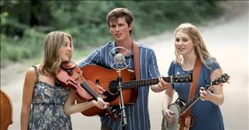 <p>Listen to this beautiful bluegrass tune that is called &lsquo;Down That Dirt Road&rsquo; from The Petersens.</p>

<p>&lsquo;Skippin' rocks and jumpin' off that bridge down by the creek</p>

<p>I still feel the damp of that tall grass underneath my bare feet</p>

<p>And across the yard, a big red barn ever-etched there in my mind</p>

<p>Tossed me the keys to that old truck and taught me how to drive&rsquo;</p>

<p>What a wonderful performance of this original song! The instruments and vocal harmonies sound amazing together, and the melody of the song is so pleasing to hear. And how very fitting that the band is singing the song &lsquo;Down That Dirt Road&rsquo; on an old country dirt road.</p>

<p>&ldquo;Katie, Emmett, and our friend Johnny Meyer wrote this song about our grandparents' farm in Mountain Grove, Missouri. It's often the simple things in life that mean the most,&rdquo; writes The Petersens in the <a href="https://www.youtube.com/watch?v=MMAgXS190lc">caption </a>of their YouTube video. What a lovely thing to write a song about and something that this family will cherish for years to come. The nostalgia can truly be felt in this music!</p>

<p>&ldquo;Just perfect. Makes me think of the home I grew up in down another dirt road!&rdquo; <a href="https://www.youtube.com/watch?v=MMAgXS190lc">comments </a>one person on YouTube after watching the video.</p>

<p>&ldquo;Lovely song. Traditional country with the magical Peterson touch. And I do realize this is a new song, but it will be traditional soon enough,&rdquo; <a href="https://www.youtube.com/watch?v=MMAgXS190lc">writes </a>another person online.</p>

<p>The Petersens are a captivating and talented family band that performs full-time in Branson, Missouri. They celebrate American roots music with family values, and their music is one that truly uplifts and encourages. The band consists of four siblings, Katie, Ellen, Matt, and Julianne, their mother Karen, and good friend Emmett Franz.</p>

<p>We hope that you enjoyed listening to this original song from The Petersens today!</p>
