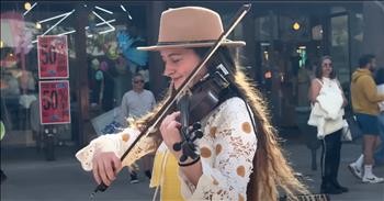 <p>Watch this talented teen violinist perform a wonderful rendition of John Denver&rsquo;s classic song &lsquo;Take Me Home, Country Roads&rsquo;</p>

<p>&lsquo;Almost Heaven, West Virginia</p>

<p>Blue Ridge Mountains, Shenandoah River</p>

<p>Life is old there, older than the trees</p>

<p>Younger than the mountains, growin' like a breeze&rsquo;</p>

<p>What a beautiful violin version of this John Denver hit! Avelina Kushnir is the violinist in the video and puts on such a lovely performance. Many people in the street stop to enjoy her musical performance and smiles creep across their faces as they watch Avelina move about. The way she gracefully plays her instrument and moves around is a delight!</p>

<p>Avenlina is 15 years old, and along with the violin, she also plays the saxophone and the guitar. She loves playing music and hopes that she can use her talent to make the world a better place. Many people watch her violin performances online, and her talent blows them away.</p>

<p>&ldquo;Avelina's charisma, wonderful violin performances, and dancing are always a great delight for the eyes, the ear, the soul, and the heart,&rdquo; <a href="https://www.youtube.com/watch?v=Q7OCy-fRV8E">comments </a>one person on YouTube.</p>

<p>&ldquo;Avelina, you've absolutely nailed this with your beautiful playing, and you look stunning in your lovely outfit and cowboy hat! Another great video! Thank you for sharing,&rdquo; <a href="https://www.youtube.com/watch?v=Q7OCy-fRV8E">writes </a>another person online.</p>

<p>As for the song &lsquo;Take Me Home, Country Roads,&rsquo; it was written by Bill Danoff, Taffy Nivert and John Denver. The song was released as a single by John Denver on April 12, 1971, and it peaked at number two on Billboard&rsquo;s US Hot 100 singles list. &lsquo;Take Me Home, Country Roads&rsquo; has continued to remain popular and loved throughout the decades, and it has become one of John Denver&rsquo;s most popular songs.</p>

<p>We hope that you enjoyed watching this violin performance from Avelina Kushnir of &lsquo;Take Me Home, Country Roads&rsquo; today!</p>
