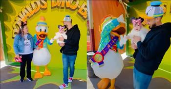 <p>An adorable child was captured on camera clinging to Donald Duck's hand in a precious, heartwarming moment.</p>

<p>Walt Disney World in Central Florida and the Disney Company's many parks around the world are magical places. They are unlike any other theme park or amusement park you'll visit. Disney World is built on nostalgia, creating magical, once-in-a-lifetime moments. The memories families make at Disney's parks will be remembered and looked fondly back on for the rest of their lives.</p>

<p>Also, Disney World is an incredibly special place, especially for youngsters, because of who they can meet at those parks. Nowhere else can you interact with and get a hug from Mickey Mouse, Pluto, Goofy and Winnie the Pooh. A child's favorite cartoon characters become real at Disney World.</p>

<p>A <a href="https://www.youtube.com/shorts/Rc0G_hovMsM">short but incredibly adorable clip</a> shows how one child reacted when meeting one important and highly recognizable Disney character: Donald Duck. Characters have meet-and-greets at particular places throughout Disney's four Central Florida theme parks. During these times, children can meet the characters, hug them and get a photo taken with them.</p>

<p>After meeting the beloved cartoon duck, one child did not want to let go of Donald. Following the photo, as mom and dad started to walk away from the character, the baby, in dad's arms, was not finished with Donald. The baby continued to hold onto the character's hand.</p>

<p>Dad even tried to break the baby's grasp on the character, but Donald was not having it. Donald actually swatted away Dad's hand, blocking his attempts to free Donald from the child, who was obviously enamored with Donald.</p>

<p>What an unbelievably sweet moment and memory. It's one the family will remember forever. That's the kind of sweet, unexpected interactions and moments that Disney is known for creating.</p>

<p><em><strong><a href="https://www.godtube.com/bible/proverbs/22-6">Proverbs 22:6</a></strong> "If a child is trained up in the right way, even when he is old he will not be turned away from it."</em></p>
