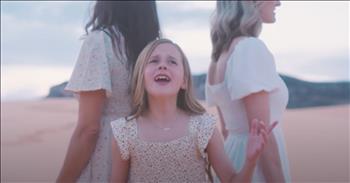 <p>This trio&rsquo;s beautiful &lsquo;There Is A Green Hill Far Away&rsquo; cover will give you chills. It begins with a sweet little girl named Claire Crosby alongside her Aunt Kathryn and Aunt Becca, and it is nothing short of enchanting. This little girl's stunning voice brings a fresh and heartfelt interpretation to the beloved hymn, making it a truly memorable experience.</p>

<p>The video opens with a striking scene: Claire, dressed in a beautiful, flowing dress, sings alone amid a vast, desert landscape. Her voice is clear and poignant, carrying the melody with a grace that instantly captures the viewer's attention. The barren, sandy surroundings contrast sharply with the lush, verdant imagery that follows, creating a visual journey that mirrors the song&rsquo;s theme of hope and renewal.</p>

<p>As Claire&rsquo;s voice fills the desert air, the camera gradually transitions to scenes of lush green fields, embodying the hymn&rsquo;s message of peace and paradise. This shift from the stark desert to the vibrant greenery highlights the song's beauty and underscores the message of finding hope and solace in faith. The imagery is powerful and soothing, enhancing the emotional depth of the performance.</p>

<p>Claire is joined by her Aunt Kathryn and Aunt Becca, who add their harmonies to the mix, creating a rich and harmonious sound. The trio&rsquo;s voices blend beautifully, each note resonating with the warmth and depth of their shared faith. Their collaboration brings a sense of intimacy and familial love to the performance, making it even more special.</p>

<p>The video&rsquo;s cinematography is a visual masterpiece, skillfully capturing the contrast between the arid desert and the lush green hills. The scenes are thoughtfully composed, using light and color to enhance the mood and emotion of the song. The transition from the barren landscape to the vibrant fields visually represents the hymn's themes of spiritual renewal and hope.</p>

<p>Claire&rsquo;s performance, coupled with the stunning visuals and the harmonious contributions of her aunts, creates a deeply moving rendition of 'There Is a Green Hill Far Away.' It&rsquo;s a celebration of faith, family, and the beauty of finding peace in God&rsquo;s promises. Whether you're familiar with the hymn or new to it, this video is sure to leave a lasting impression, showcasing Claire Crosby&rsquo;s remarkable talent and the heartfelt connection between her and her family.</p>

<p><em><strong><a href="https://www.godtube.com/bible/isaiah/40-1">Isaiah 40:1</a></strong> "Comfort, comfort my people, says your God."</em></p>
