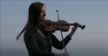 <p>Taryn Harbridge's recent violin rendition of &lsquo;They'll Know We Are Christians By Our Love&rsquo; is nothing short of beautiful and absolutely breathtaking.&nbsp;</p>

<p>As the first of the melodious notes ring out from Taryn&rsquo;s violin, the imagery on the screen shows lush landscapes, including bushes, flowers, and trees. At last, it cuts to Taryn, who we see is surrounded by mountains, and her performance unfolds with a seemingly otherworldly grace.</p>

<p>As we see Taryn drawing her bow across the violin&rsquo;s strings, her talent shines brightly. Though no one gives voice to the lyrics of this song, the notes of the violin translate into a beautiful, emotive language that speaks directly to the heart. This song's message of love and unity comes alive in the way Taryn weaves the melody through her instrument.</p>

<p>Taryn's love for Jesus is evident in every stroke of her bow. With over 150,000 <a href="https://www.youtube.com/@TarynHarbridge">subscribers</a>, she has captured the admiration of many who appreciate her incredible skill and heartfelt expression. Her performance is more than just a showcase of technical proficiency&mdash;it&rsquo;s a moving testament to her devotion and passion. What an incredible talent to have and to share with the world. The video&rsquo;s combination of stunning natural scenery and Taryn&rsquo;s soulful playing creates a visual and auditory experience that is both calming and inspiring, ushering our hearts into a moment to worship our savior.</p>

<p>This beautiful gift of music is such a wonderful reminder of the power of love and faith expressed through art. We hope that you find as much joy and inspiration in Taryn Harbridge&rsquo;s rendition of the song &lsquo;They'll Know We Are Christians By Our Love&rsquo; as we did. It&rsquo;s a stunning performance you definitely don&rsquo;t want to miss.</p>

<p><em><strong><a href="https://www.godtube.com/bible/john/13-35">John 13:35</a></strong>&nbsp; "By this everyone will know that you are my disciples, if you love one another."</em></p>
