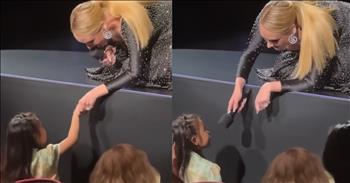 <p>A young fan gets spotted by Adele at her concert, and it is absolutely precious. Watch as Adele stops to talk with her little concert buddy.</p>

<p>This video clip starts at an Adele concert. We see Adele simply talking with her audience when she spots an adorable young fan sitting in the front row. Adele stops mid-sentence to say hello to the little girl. This little girl is just so blessed to be called out by Adele. I bet she&rsquo;s just so tickled.</p>

<p>Adele decides to bend down, even in her long, beautiful gown so that she can speak with her young fan more personally. She tells the little girl it&rsquo;s nice to meet her and asks, &ldquo;What&rsquo;s your name?&rdquo; The little girl responded to Adele, &ldquo;Kathy.&rdquo; The crowd cheers as Adele repeats her name louder into the microphone. The little girl is then asked how old she is, and she responds a little more clearly, &ldquo;Five!&rdquo; Adele hilariously then says, &ldquo;Five? Is that right? I&rsquo;m thirty-six.&rdquo; The audience laughs.</p>

<p>Adele continues her sweet conversation with the little girl by asking Kathy if she&rsquo;s enjoying the show and by talking about what Kathy is wearing. Adele also thanks her young fan, Kathy, for coming to her show. Before Adele starts to get up, she tells Kathy how cute she is. It&rsquo;s such a sweet interaction. The clip ends with Adele joking about how difficult it is going to be to stand up in her dress. Again, the crowd bursts into laughter.&nbsp;</p>

<p>How sweet of Adele to stop to talk with this little fan, Kathy. I&rsquo;m sure Kathy and her parents felt so special! Adele&rsquo;s kindness and tenderheartedness are shown in this intimate interaction.</p>

<p><em><strong><a href="https://www.godtube.com/bible/ephesians/4-32">Ephesians 4:32</a></strong> - Be kind to one another, tenderhearted, forgiving one another, as God in Christ forgave you.</em></p>
