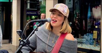 <p>Prepared to be amazed by the talent of this young woman on a sidewalk in the city. Street performer wows with mesmerizing cover of 'What's Love Got To Do With It.'</p>

<p>Allie Sherlock begins to play her guitar and sing as a crowd gathers around. She is dressed casually in a hat and jeans, but there is nothing casual about her voice. Right from the start, you want to hear more from Allie. She is a vocal powerhouse with soul and flare.&nbsp;</p>

<p>Once Allie gets to the chorus, she belts with confidence and has a great rhythm and a rich sound. People of all ages are circling around to hear her phenomenal performance. Allie has a unique and radio-like voice. She is an entertaining performer, and you want to hear what she will do vocally next. As she takes you back to the 80s with this Whitney Houston hit, Allie does a great job bridging decades between this original recording and making it her own today.</p>

<p>The lyrics say,</p>

<p>&lsquo;What's love got to do, got to do with it?</p>

<p>Who needs a heart when a heart can be broken?&rsquo;</p>

<p>Allie sings with true emotion. She is portraying the feelings of the original of the realization and fear of being willing to fall in love. At the end of her song, the audience cheers and claps for a song well done. This song reminds us that fear can hold us back from wonderful relationships. Unfortunately, many people allow fear to hold them back from having a relationship with Jesus. May we remember that we can accept the invitation of relationship with Christ, and He never lets us down. His Love has everything to do with it.&nbsp;&nbsp;</p>

<p><em>&ldquo;There is no fear in love. But perfect love drives out fear, because fear has to do with punishment. The one who fears is not made perfect in love. We love because he first loved us.&rdquo; <strong><a href="https://www.godtube.com/bible/1-John/4-18">1 John 4:18-19</a></strong></em></p>
