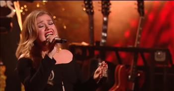 <p>The incredibly talented Kelly Clarkson put on a show-stopping live rendition of her Christmas tune, &ldquo;Underneath the Tree.&rdquo;</p>

<p>Christmas is a wonderful time of year. Many would argue, and rightly so, that Christmas is the best time of the entire year. It&rsquo;s an opportunity to spend time with family and friends while participating in those annual traditions. Also, plenty of delicious food and gifts are usually exchanged at these gatherings.&nbsp;</p>

<p>So, with all of that, how could anyone dislike or even despise the Christmas season? Sadly, Christmas can also be a painful, depressing and lonely time of year for some. It can remind them of what they no longer have or have lost.</p>

<p><a href="https://www.youtube.com/watch?v=s9vdRkdF60Y">In a clip posted on YouTube</a>, the original American Idol, Kelly Clarkson, magnificently performs her beloved Christmas classic, &ldquo;Underneath the Tree.&rdquo; It&rsquo;s an upbeat, catchy and toe-tapping tune about missing someone and being alone on Christmas Day.</p>

<p>&ldquo;You&rsquo;re here where you should be</p>

<p>Snow is falling as the carolers sing</p>

<p>It just wasn&rsquo;t the same</p>

<p>Alone on Christmas Day&rdquo;</p>

<p>Eventually, as the lyrics mention, the couple is reunited. Kelly then belts out that once this person is back with her, he is all she needs. She doesn&rsquo;t need anything else underneath the tree; this person is all she needs.</p>

<p>Kelly is one of the biggest names in all of entertainment, and in this short clip, she proves why that is the case. Her talent is incredible. The woman can sing absolutely anything.&nbsp;</p>

<p>Being alone or without your significant other on Christmas Day would be awful and heartbreaking. That&rsquo;s why, especially around the Christmas season, we should make it a point to reach out to those people who might be suffering or hurting around the holiday season.</p>

<p>Feeling alone or forgotten, especially around the holidays, can be devastating. A little bit of kindness or a small, unexpected act of love could have a significant impact on someone who is suffering in silence.</p>

<p><em><strong><a href="https://www.godtube.com/bible/ephesians/4-32">Ephesians 4:32</a></strong> &ldquo;And be kind to one another, full of pity, having forgiveness for one another, even as God in Christ had forgiveness for you.&rdquo;</em></p>
