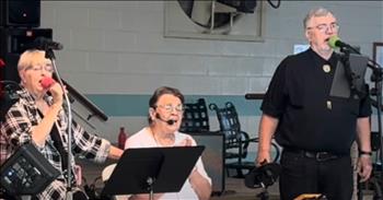 <p>When was the last time that you were in awe of God&rsquo;s glory? Check out this heartfelt rendition of 'We Are Standing On Holy Ground.'</p>

<p>Enjoy this video of Fig Tree Church worship in Harlingen, Texas. Kay Cannon and Sandy Hood Harlingen sing their hearts out in this clip. At the start, we see a group of seasoned musicians and singers on the stage. It will bless you to hear these beautiful voices singing this classic song in their old age. These women are not allowing age to limit their ministry to others in sharing the gospel with others.</p>

<p>It is truly touching to hear the congregation join in on the chorus with this group of worship leaders. The lead vocalist welcomes them by singing with them. It will have you joining in and singing, too. They remind us through the lyrics that the presence of God brings us joy, and that we have a Savior who is holy and set apart. This is why it is such a big deal that we who are imperfect can be in the presence of our perfect God. Jesus has given us His righteousness, and this song reminds us of this beautiful eternal gift.</p>

<p>We see eyes closed and hands lifted from this worshipful and Spirit-filled group of worship leaders. This is not just a song, but you can sense a genuine love for Christ. They are using their talents to glorify Him. As they sing, this woman cannot physically stand, but she is singing about standing in the presence of God. He is there with her and with us. No matter what our physical posture is before Him, our hearts can be standing on the holy ground of God because of the reconciliation that Jesus provides. He loves us and cares for our every need. He is our perfect Savior.</p>

<p><em>&ldquo;Then he said, &ldquo;Do not come near; take your sandals off your feet, for the place on which you are standing is holy ground.&rdquo; &nbsp;<strong><a href="https://www.godtube.com/bible/Exodus/3-5">Exodus 3:5</a></strong></em></p>
