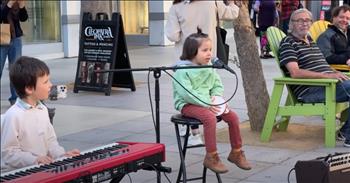 <p>Prepare to be encouraged by the musical giftings of three young people. A little boy accompanies a little girl who sings alongside teenage violin sensation Karolina Protsenko. Watch this incredible performance of a 3-year-old&rsquo;s adorable rendition of &lsquo;Hallelujah&rsquo; that will melt your heart.&nbsp;</p>

<p>At the start of the song, the boy plays wonderful piano notes, and then Karolina jumps in with a stellar violin melody. She dances with joy as the little girl plays the tambourine. There is a large live audience of shoppers in the streets of Los Angeles and onlookers walking by. As the Christmas tree is decorated and the holiday spirit is in the air, these young people choose a song to remind us of the reason we celebrate Christmas.</p>

<p>Karolina plays through the hit song with flare and style. She is so excited and is a flawless performer. Everyone watching is entertained and excited about the performance. After the trio played through the song, the surprise moment is hearing the little girl come in singing the final chorus. Her voice is precious. She is a wonderful singer and her little voice sings out, &ldquo;<em>Ha-way-lu-iah</em>.&rdquo; It will melt your heart.</p>

<p>The preschooler sits there on a stool with her high ponytail on her head and with her tambourine in hand. She is so brave to sing out in front of the crowd around. Karolina then wraps up the song and it is a precious performance. Everyone watching claps for these young performers. As you view the clip, may you delight in the worship of God and in hearing the littlest of people sing a song that points others to Him. He is worthy of all praise.&nbsp;</p>

<p><em>&ldquo;Praise the Lord. Give thanks to the Lord, for he is good; his love endures forever. Who can proclaim the mighty acts of the Lord or fully declare his praise?&nbsp; <strong><a href="https://www.godtube.com/bible/Psalms/106-1">Psalm 106:1-2</a></strong></em></p>
