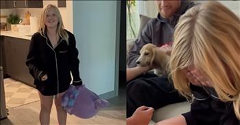 <p>What a precious moment you don&rsquo;t want to miss. After longing for a furry best friend, a little girl&rsquo;s sweet, heartwarming response to a puppy surprise will melt your heart. Sometimes, the sweetest gifts in life are ones you never saw coming. They&rsquo;re the kind we whisper to God and pray one day it will happen. That&rsquo;s what happened to this little girl whose heart was cracked wide open with hope when she got home from school and stood amongst the dog toys scattered on the floor.&nbsp;</p>

<p>Her brother couldn&rsquo;t help but ask and question his mom about the toys. Mom played along, her smile betraying nothing but a twinkle in her eye. Then Dad dropped a pillow that was hiding something precious in his lap. Sitting in the living room, calm as a morning sunrise, he held a tiny dachshund on his lap named Toast. The puppy wiggled, impossibly small but so impossibly perfect.&nbsp;</p>

<p>The little girl stood frozen for just a moment, and then, like the first crack of dawn spilling light across the horizon, her tears came. This wasn't just a puppy; this was Toast&ndash;an answered prayer tucked deep into the depths of her heart. Toast wagged her tail and licked the little girl&rsquo;s fingertips. She reached out for Toast, her hands trembling with the kind of joy too big to contain as she petted her soft fur. Her daddy then pulled her close, wrapping them both in a hug and creating a memory she would forget.&nbsp;</p>

<p>Dogs have a way of slipping into the spaces we didn&rsquo;t know were empty. They&rsquo;re not just companions, and they&rsquo;re family. They chase away loneliness, bring laughter to the quiet, and teach us in their unspoken way about love that doesn&rsquo;t keep score.&nbsp;</p>

<p>Toast will undoubtedly create hundreds of memories for this little family&ndash;especially for this sweet little girl whose dream of having a dog came true.&nbsp;</p>

<p><em><strong><a href="https://www.godtube.com/bible/james/1-17">James 1:17</a></strong> "Every good and perfect gift is from above, coming down from the Father of the heavenly lights, who does not change like shifting shadows."&nbsp;</em></p>
