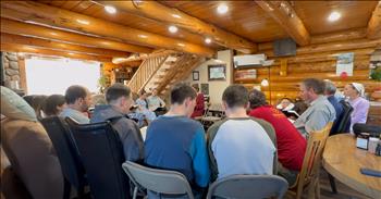 <p>Some families gather around video games, lost in the buzz of virtual worlds. Others roll dice over board games or cheer for their favorite teams on TV, their living rooms echoing with shouts and laughter. But in a log <a href="https://www.youtube.com/watch?v=OZBQVGVUNZY">home</a> in Libby, Montana, one family does something altogether different. They gather to sing hymns. This large family&rsquo;s soul-stirring performance of &lsquo;In The Sweet By and By&rsquo; will have you humming to yourself the rest of the day.&nbsp;</p>

<p>In a world that moves fast and fragments easily, this family found a way to hold tight to what matters most&mdash;being together and worshiping the Lord. Their rendition is the sound of hearts intertwined, honoring their Amish <a href="https://www.youtube.com/watch?v=OZBQVGVUNZY">mother</a>, Orpha in the most tender way. In that moment, the living room becomes a sanctuary with more than two dozen gathered around in a circle. Their voices sing in rounds, carrying love and faith to the rafters and beyond.&nbsp;</p>

<p>The idea of singing together as a family never occurred to me. It&rsquo;s one thing to sing together at church but it&rsquo;s another new idea all together to sing in the cozy comfort of home. It&rsquo;s a sweet way to honor their mother, who poured her heart and soul into their lives.&nbsp;</p>

<p>While some families share memories over board games, campfires, and remote controls, this family sings, weaving their lives together in harmony. It&rsquo;s a practice steeped in faith, gratitude and the deep understanding that moments like these are sacred and fleeting.&nbsp;</p>

<p>What a beautiful way to spend time together, lifting hymns that remind us of where we&rsquo;re headed. In a world of distractions, this family reminds us of something unshakable: the joy of gathering, singing, and pointing one another heavenward.</p>

<p><em><strong><a href="https://www.godtube.com/bible/ephesians/5-19">Ephesians 5:19</a></strong> "Speaking to one another with psalms, hymns, and songs from the Spirit. Sing and make music from your heart to the Lord."</em></p>
