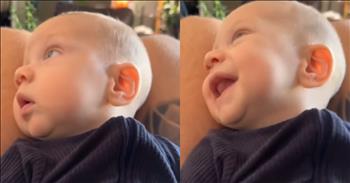 <p>This sweet child&rsquo;s heart-melting response to Mom and Dad&rsquo;s wedding photos will leave you charmed! While Mom Kendyll Kirkton was going about her work day, Dad captured a few precious moments of their little boy on video and sent it Mom&rsquo;s way. What a wonderful surprise!</p>

<p>The blue-eyed baby boy, dressed in a cuddly navy blue sleeper, reclines on his father&rsquo;s thighs. They are having some guy time when the observant infant looks to his right and spies a couple of photos. It takes a moment, but he soon realizes that the pretty face staring back at him from the wall is his mommy. She and Dad look beautiful and blissful on their wedding day.</p>

<p>The baby boy smiles big at his recognition! With delight, he extends his tiny hand in the direction of his mother. The precious nugget turns back toward Dad and squirms happily in Dad&rsquo;s lap. And, soon, the tike returns his gaze to Mommy and breaks into a smile all over again. Mom and Dad sure do make this sweet pea happy!</p>

<p>It&rsquo;s sometimes hard for young moms to leave their little ones at home when they go to work. However, Kendyll&rsquo;s tiny blessing is fortunate to be in Dad&rsquo;s capable hands. No doubt, the surprise message and video from Dad made Kendyll&rsquo;s day. She shared in an <a href="https://www.instagram.com/reel/DEsnUxRydYQ/">Instagram post</a>, which <a href="https://www.inspiremore.com/baby-has-cutest-reaction-to-seeing-mom-in-wedding-photos/">received 4 million views</a>, &ldquo;It melted my mom heart and I couldn&rsquo;t wait to get home and snuggle him.&rdquo; He definitely looks snuggly!&nbsp;</p>

<p>Commenters agree, assuring her that it would certainly be understandable if she felt the need to head home early. <a href="https://www.inspiremore.com/baby-has-cutest-reaction-to-seeing-mom-in-wedding-photos/">One wrote</a>, &ldquo;I would have emailed this to my boss with subject: in case you&rsquo;re looking for me.&rdquo;</p>

<p>Before long, Kendyll&rsquo;s little baby will be a big boy, so it&rsquo;s awesome that her husband was thoughtful enough to notice and share that sweet moment with her. Little kindnesses like that mean a lot to working mothers!&nbsp;</p>

<p><em>&ldquo;May your father and mother rejoice; may she who gave you birth be joyful!&rdquo; <strong><a href="https://www.godtube.com/bible/proverbs/23-25">Proverbs 23:25</a></strong></em></p>
