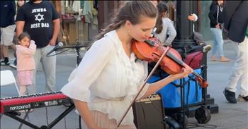 <p>A teenage violinist stunned with her cover of &ldquo;And I Love Her&rdquo; by The Beatles. The young woman demonstrated her skill and expertise on the stringed instrument as she played the classic song. Watch the short but delightful clip to hear and watch her perform &ldquo;And I Love Her.&rdquo;</p>

<p>There are not many bands that have had the influence of The Beatles. Some may argue (correctly, I would add) that the four lads from Liverpool are the most influential band of all time. They are certainly one of the most beloved. You cannot get away from their music. Their tunes are regularly featured in movies, TV shows and commercials.</p>

<p>The Beatles&rsquo; music continues to be played and enjoyed worldwide and is constantly covered by other musicians. Karolina Protsenko is one of the latest musicians to cover a song originally written, recorded and performed by John, Paul, George and Ringo. In a <a href="https://www.youtube.com/watch?v=-mb0fPM68y8">clip posted on YouTube</a>, she played &ldquo;And I Love Her.&rdquo;</p>

<p>The young woman puts on a dazzling performance as she twists, turns and hops around while she plays her violin, performing The Beatles&rsquo; tune from 1964. The camera catches some of the members of her crowd standing and taking in the instrumental performance. They are enchanted, unable to take their eyes off Karolina&rsquo;s lovely public musical performance. Several people enjoyed her performance so much that they are seen walking up and placing money in a basket on the ground.</p>

<p>She doesn&rsquo;t miss or fail to hit a note throughout the clip. While listening to the young woman play her violin, you&rsquo;ll probably find yourself adding in the lyrics.</p>

<p>Karolina has produced and released dozens of clips where she plays beloved songs with her violin. They are all lovely and incredibly delightful. But the one thing that is the same in all those clips is that she genuinely appears to love playing. She always has a smile and dances around while performing.</p>

<p><em><strong><a href="https://www.godtube.com/bible/ephesians/5-19">Ephesians 5:19</a></strong> &ldquo;Speaking to yourselves in psalms and hymns and spiritual songs, singing and making melody in your heart to the Lord;&rdquo;</em></p>
