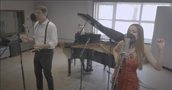 <p>Oh, friend, this one feels like the kind of story you tuck deep in your heart &mdash; the kind that tastes like nostalgia and sounds like the gentle hum of a vinyl record spinning on a Saturday night. A father-daughter duo dazzles with Frank Sinatra&rsquo;s &lsquo;Fly Me to the Moon.&rsquo;</p>

<p>Adrian and Emma-Jean <a href="https://aejmusic.com/about-us#bio">Galliard</a>, a father-daughter duo from Johannesburg, South Africa, have made a quiet little habit of leaving the internet dazzled and teary-eyed. And their latest performance is no exception. In a reel that has swept through social media, the two breathe new life into Frank Sinatra's classic, &lsquo;Fly Me To The Moon,&rsquo; and it's nothing short of magic.</p>

<p>Picture it. Dad, sharp as ever, standing tall in a crisp white shirt, slacks, and a playful bow tie, channels a little of that old-school charm. Emma-Jean, radiant in an orange dress that feels plucked straight out of the 1950s, spins the kind of elegance you rarely see anymore. Together, they don&rsquo;t just sing &mdash; they have fun. The kind of fun where you can hear the inside jokes between notes, the winks and giggles tucked into harmonies.</p>

<p>From the very first note, you see it &mdash; the bond. The sacred, shimmering connection between a little girl and her hero. Because that&rsquo;s what dads are, aren&rsquo;t they? The first ones who spin us around the kitchen floor to teach us the rhythm of life and to show us that we are worth being danced with and sung over.</p>

<p>Adrian isn&rsquo;t just Emma-Jean&rsquo;s duet partner. He&rsquo;s the one who first held her tiny hand and pointed her toward the music. And Emma-Jean? She&rsquo;s the one who grew up watching her dad on stage, eyes wide, heart open, already learning how music stitches people together. When <a href="https://aejmusic.com/about-us#bio">COVID</a> shut down the world, they did what artists do &mdash; they sang. They made videos just to pass the time, never knowing that they were about to accidentally unlock a global audience who would be smitten by their harmonies and humbled by their heart.</p>

<p>Since then? They've been touring South Africa and the UK, telling stories through their show <em><a href="https://aejmusic.com/about-us#bio">Striking a Chord</a></em>, reminding people everywhere of the beauty of music and family, the way melody can carry us when words aren't quite enough. And now they&rsquo;re preparing to cross oceans again, heading to Vancouver for even more shared songs and stories.</p>

<p>But you see &mdash; what makes their singing special isn't just technical skill or pretty staging. It's the fact that you can feel the love. You can see a dad beaming at his little girl, proud beyond words. You can hear the delight in Emma-Jean&rsquo;s voice as she harmonizes with the man who has been her first audience since she was singing lullabies before she could talk.</p>

<p>And isn&rsquo;t this the sweetest reminder? The kind we all need? That maybe God, in His goodness, gives us dads so we always have someone who believes in us &mdash; someone who will sing the melody while we find our harmony.</p>

<p>In a world that sometimes feels loud with the wrong kind of noise, this father-daughter duet offers a gentle hush, a soft space where joy still sounds like a classic tune and love still looks like a dad and his little girl singing under the glow of the spotlight.</p>

<p>Maybe today, you just needed to remember that God Himself is the kind of Father who not only sings over us but invites us into the song.</p>

<p><em><strong><a href="https://www.godtube.com/bible/zephaniah/3-17">Zephaniah 3:17</a></strong> &ldquo;He will rejoice over you with singing.&rdquo;</em></p>
