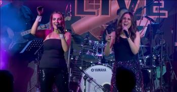 <p>The classic song, &lsquo;Dancing Queen,&rsquo; is performed by Sing it Live. An energetic and lively performance lightens the crowd and brings a new sound to &lsquo;Dancing Queen&rsquo; in this must-hear cover.&nbsp;</p>

<p>&lsquo;Dancing Queen&rsquo; was originally written and released by ABBA. It has been a popular song for many years. Sing it Live is not the first band or performer to cover &lsquo;Dancing Queen,&rsquo; as many other artists have performed their own renditions, such as Cher. Since &ldquo;Dancing Queen&rdquo; is a fan-favorite of ABBA fans, many other artists want to try their own hand at this classic piece.&nbsp;</p>

<p>Sing it Live is founded and produced by Darren Mullen. The artists within the band include Crafty, Stuart Day, Michael Marino, Damien Steele Scott, Tzan Niko, Mario Marino, Melissa McCaig, Nikki Heuskes, Chloe Castledine, Zkye Compson-Harris, Andy Seymour, Akasha Starr, Shaun Holton, Rachael Leahcar, Stefan Hauk, Tib Horvath, and Cameron Blokland. The two women singing &lsquo;Dancing Queen&rsquo; in the video are Nikki Heuskes and Chloe Castledine. The duet performs &lsquo;Dancing Queen&rsquo; with steadfast energy and zeal.&nbsp;</p>

<p>Their passion for music is shown by their vocal range and their desire to engage the audience. Many artists are not lively or energetic in their performances; however, Sing it Live normally brings power into the room. They want to ensure the crowd is uplifted and dancing with them. As we continue to watch the video, we will notice the crowd is excited, dancing, and moving along with Nikki Heuskes and Chloe Castledine.</p>

<p>A disco ball is hanging from the ceiling, and everything is set up for a dance party. Within Sing it Live&rsquo;s performance of &lsquo;Dancing Queen,&rsquo; everyone truly felt like their own dancing queen. This must-hear cover helps us to remember to relax and take time to truly enjoy ourselves. Dancing and singing along to our favorite songs might be just what our soul needs this week.</p>

<p><em>&ldquo;Let them praise his name with dancing and make music to him with timbrel and harp&rdquo; - <strong><a href="https://www.godtube.com/bible/psalms/149-3">Psalm 149:3</a></strong></em></p>
