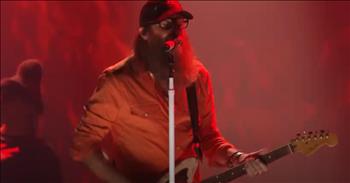 <p>There&rsquo;s something sacred and spunky when heaven meets a banjo and a beat drops in the middle of a laundry pile. And let me just say&mdash;Crowder at the Dove Awards? Electric. From the first stomp of the beat to the last hallelujah note, this performance of Crowder&rsquo;s electrifying Live &lsquo;Grave Robber&rsquo; will have you praising with a grin so wide your cheeks hurt.</p>

<p>Crowder, a wild-bearded and bold worshiper, turned the stage into a joy explosion, and we&rsquo;re still not over it. I mean, who knew a resurrection anthem could double as your go-to soundtrack for scrubbing the stovetop or chasing toddlers with peanut butter hands? But that&rsquo;s the thing about &lsquo;Grave Robber&rsquo;&mdash;it&rsquo;s got grit and glory, joy and Jesus all bundled up in a toe-tapping, soul-shouting celebration.</p>

<p>This isn&rsquo;t just another performance. No, this was a full-on pep rally for the One who rolled the stone away. In the video, the entire room pulsed with life, the kind only a risen Savior can give. The drums pounded like a heartbeat, the guitars wailed like freedom, and Crowder&rsquo;s unmistakable voice carried words that reached right into your ordinary and reminded you: you&rsquo;ve been raised, redeemed, and rerouted straight into the arms of grace.</p>

<p>It&rsquo;s the kind of song that makes folding three loads of towels feel like a revival. It belongs on your &lsquo;Conquer the Chores' playlist right next to &lsquo;Good God Almighty&rsquo; and that other Crowder banger you secretly sing into your broom handle. Whether you're mowing the lawn, mopping the floor, or trying to survive that Monday morning commute, this music video is your invitation to praise your way through it.</p>

<p>So maybe today you&rsquo;ve got a mountain of laundry and a sink full of dishes. Or maybe your soul just needs a little lift. Put this one on. Turn it up. Thank the Lord who robbed your grave and gave you this breath. And then dance your way through the dishes, friend.</p>

<p>Because joy looks good on you.<br />
And worship? It was made for the wild and the wonderfully ordinary.</p>

<p>We hope you loved every electrifying, holy-rolling, goosebump-inducing second of this fabulous Grave Robbing moment.</p>

<p>Now go on&mdash;press play again. Your mop is waiting.</p>

<p><em><strong><a href="https://www.godtube.com/bible/romans/8-11">Romans 8:11</a></strong> &ldquo;And if the Spirit of him who raised Jesus from the dead is living in you, he who raised Christ from the dead will also give life to your mortal bodies because of his Spirit who lives in you.&rdquo;</em></p>
