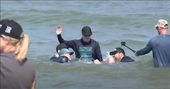 <p>Nearly 2,000 people were baptized in a powerful display of their commitment to Christ. All who participated in the moving, massive baptismal service signaled their decision to forsake their old ways and follow Jesus Christ. Watch the short but tear-jerking and powerful clip to see thousands receive baptism and make a decision for Christ.</p>

<p>None of us would have a chance if not for the love, mercy and grace of Jesus Christ. Without those life-changing gifts, we&rsquo;d all still be lost, living in sin and shame. We&rsquo;d all be staring down an eternity of being lost and forever separated from Him once our days on Earth come to an end.&nbsp;</p>

<p>However, we now have hope and a future due to Christ&rsquo;s never-ending and inexplicable love for us. Love, forgiveness, grace and hope are freely offered and given to all who turn to Him and ask for His forgiveness. He is faithful and quick to do so, cleansing the heart and providing a peace that surpasses all understanding and knowledge.</p>

<p><a href="https://www.youtube.com/watch?v=Yp2MgClPu7g">A clip posted on YouTube</a> shows approximately 2,000 people who have made a decision for Christ, asked for His forgiveness and chosen to follow Him. In an outward display of their commitment and to demonstrate what has already occurred in their hearts, they were baptized in the Atlantic Ocean.</p>

<p>The powerful service took place in Jacksonville, Florida, and was put on by The Church Eleven22. In total, more than 11,00 people were in attendance.</p>

<p>The church&rsquo;s pastor, Joby Martin, explained the importance of baptism and why the massive beach service was a reason to become excited and celebrate with those who have made a commitment to Jesus Christ.</p>

<p>&ldquo;Baptism is a public declaration that Jesus Christ is your Lord and Savior,&rdquo; he said. &ldquo;And it&rsquo;s not the water that baptizes you; it&rsquo;s that relationship that you have with Christ, through the Gospel of Jesus. And so, this is just an opportunity for us to celebrate these people whose sins have been washed away, and they&rsquo;ve been resurrected to a newness of life.&rdquo;</p>

<p><em><strong><a href="https://www.godtube.com/bible/acts/2-38">Acts 2:38</a></strong> &ldquo;And Peter said, &lsquo;Let your hearts be changed, every one of you, have baptism in the name of Jesus Christ, for the forgiveness of your sins; and you will have the Holy Spirit given to you.&rsquo;&rdquo;</em></p>
