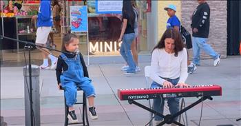 <p>A 4-year-old delivered a precious cover of an Elvis Presley classic. The little guy performed a sweet rendition of a song originally performed by the King of Rock and Roll. Watch the short but adorable clip to hear the child&rsquo;s take on the tune previously performed by Elvis Presley.</p>

<p>In the history of music, there is arguably no bigger name than Elvis Presley. He is often credited with creating an entire genre of music: rock and roll. His songs and lyrics are legendary. He&rsquo;s responsible for some of the biggest, most popular songs of all time. &ldquo;Jailhouse Rock,&rdquo; &ldquo;Don&rsquo;t Be Cruel&rdquo; and &ldquo;Suspicious Minds,&rdquo; among others, are included in his long list of iconic tunes.</p>

<p>Even decades after his death, he continues to have a massive impact on music. Musician after musician continually cites him as an influence; others constantly cover and perform his songs.</p>

<p>One of those people covering an Elvis Presley tune is Nicholas Protsenko, a 4-year-old. <a href="https://www.youtube.com/watch?v=XKKDxBnlBd0">In a clip posted on YouTube</a>, the young man performs what is likely the sweetest rendition of &ldquo;Can&rsquo;t Help Falling in Love.&rdquo;</p>

<p>Sitting on a chair, singing those unforgettable lyrics, Nicholas performs as dozens of people walk by and momentarily pause to take in the child&rsquo;s rendition of &ldquo;Can Help Falling in Love.&rdquo; You'll likely find yourself singing along while listening and watching the talented young man.</p>

<p>&ldquo;Like a river flows<br />
Surely, to the sea<br />
Darling, so it goes<br />
Some things are meant to be&rdquo;</p>

<p>While Nicholas belts out the words of the Elvis Presley song, thrilling those passing by and people who have stopped to watch, he does not perform alone. His mother, off to his right, plays the keyboard. She keeps a close eye on the little guy and, at times, even appears to mouth the song at him when he seems to have forgotten a lyric.</p>

<p><em><strong><a href="https://www.godtube.com/bible/colossians/3-16">Colossians 3:16</a></strong> &ldquo;Let the word of Christ dwell in you richly in all wisdom; teaching and admonishing one another in psalms and hymns and spiritual songs, singing with grace in your hearts to the Lord.&rdquo;</em></p>
