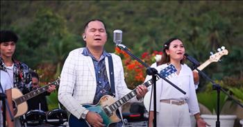 <p>I have to tell you what I just watched. What I just felt as I listened to a beloved worship song &lsquo;10,000 Reasons&rsquo; as it received a stunning rendition that will stop you in your tracks. It is the most moving, soul-stirring version I have ever heard.&nbsp;</p>

<p>Have you ever heard of worship being sung over a deep rich bass guitar with voices so incredible you stop folding laundry mid-sock? It felt like the world tilted, and God was present. The music video is by the worship team called Scenery Strains Cebu.&nbsp;</p>

<p>They were set up outside the San Roque Parish in Lutac, City of Naga, Cebu, nestled in the breathtaking hills of the Philippines, where the sun rises like a benediction and the palm trees sway like hands lifted in praise. The video captured footage of all over the island and reminded me how the layers of green, views of the ocean, and with the church behind them, it was like God&rsquo;s own cathedral!&nbsp;</p>

<p>&ldquo;Whatever may pass and whatever lies before me, Let me be singing when the evening comes&hellip;&rdquo;</p>

<p>And oh, how they sang.</p>

<p>I could barely breathe by the time they got to, &ldquo;Still my soul will sing Your praise unending&hellip;&rdquo;</p>

<p>Because isn&rsquo;t that what we want? To be the kind of people who keep singing &mdash; even after the diagnosis, the loss, the unanswered prayers. To still lift our voices from the ashes and believe there's something holy in the breaking.</p>

<p>And right there &mdash; in the middle of mango trees and gravel and the open sky &mdash; that&rsquo;s exactly what they did.</p>

<p>It felt like the song wrapped its arms around you and whispered, &ldquo;It&rsquo;s okay. God&rsquo;s still worthy. You can still bless His name.&rdquo;</p>

<p>I wanted to climb inside that moment and stay awhile. And you know what? Maybe we can. Maybe every time we remember that we have even one reason to bless the Lord &mdash; let alone 10,000 &mdash; we return to this scene in Cebu and let our souls sing again.</p>

<p>So go ahead, sweet friend. Watch the video. Let it wash over you.</p>

<p>You might cry. You probably will. But you&rsquo;ll also remember what hope sounds like.</p>

<p>And hope sounds a lot like a deep bass guitar, a handful of faithful voices, and a hillside in Cebu singing &ldquo;Bless the Lord, O my soul.&rdquo;</p>

<p><em>&ldquo;Sing to the Lord a new song; sing to the Lord, all the earth. Sing to the Lord, praise his name; proclaim his salvation day after day.&rdquo; <strong><a href="https://www.godtube.com/bible/psalms/96-1">Psalm 96:1-2</a></strong></em></p>
