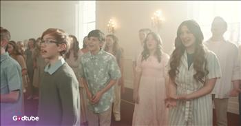 <p>This Phil Wickham tune gets a powerful cover from this children&rsquo;s choir in a video posted on YouTube. The Rise Up Children&rsquo;s Choir puts passion and unison into their version of the wonderful song. Watch the clip to see their heartfelt performance.&nbsp;</p>

<p>In the video, the large group of children of mixed ages stands upon a church stage with beautiful pale stained glass in the background. They wear pastels and sing, accompanied by the piano. Between the clips of them singing, a resurrected Jesus appears in front of his open tomb, smiling confidently because he knows his heavenly father will take him home.</p>

<p>The children&rsquo;s blended voices sound innocent and wonderful as they put lyrics to Phil Wickham&rsquo;s song, &lsquo;Behold.&rsquo; The song speaks of Christ&rsquo;s holiness and sacrifice. Some of the words are:</p>

<p>Go and see that empty tomb<br />
He's not there, for He is risen<br />
Every heart prepare Him room<br />
Jesus Christ, the King of Heaven</p>

<p>The song has some of the same lyrics and tune as &lsquo;O Come, Let Us Adore Him,&rsquo; a hymn that is often sung around Christmas. Phil changed it, adding lyrics that also make it perfect for Easter. In Phil&rsquo;s unique version, &ldquo;come let us adore him&rdquo; implies not just seeing Jesus in his infancy after his miraculous birth, like the original song, but also after his miraculous death and resurrection.&nbsp;</p>

<p>The children have such joy on their faces as they sing, and it&rsquo;s easy to understand why. The song is a song of praise and a great reminder of the hope that we have as believers in Christ Jesus. He will come again one day. He is risen; he is risen indeed.&nbsp;</p>

<p><em>&ldquo;He is not here: for he is risen, as he said. Come, see the place where the Lord lay.&rdquo; <strong><a href="https://www.godtube.com/bible/matthew/28-6">Matthew 28:6</a></strong></em></p>
