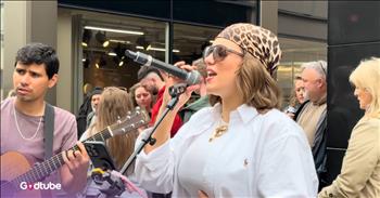 <p>Lauren Daigle's "You Say" got a chillingly beautiful cover from a street performer. It's such a terrific and expertly performed rendition that you'll likely find yourself returning to it repeatedly. Watch the short but awe-inspiring clip to listen to and see the young woman perform "You Say."</p>

<p>Christian music is full of incredibly talented artists who continually produce catchy, uplifting and encouraging songs about faith and Jesus Christ. Every few weeks, another song from someone like MercyMe, Chris Tomlin, Anne Wilson or TobyMac is released that seems destined to become a classic. Once you hear those songs, getting them out of your head can be difficult.</p>

<p>However, as full of talent as the contemporary Christian music world is, within the last 10 years or so, no song has reached the heights of Lauren Daigle's "You Say." It's universally known and beloved, having gotten a ton of play on pop radio. It's also probably one of that period's most played and covered songs. In <a href="https://www.youtube.com/watch?v=91ALc-eAeqQ">a clip posted on YouTube</a>, another young woman, Allie Sherlock, covers "You Say," and she knocks it out of the park!</p>

<p>Allie beautifully performs Lauren's classic about turning to and finding one's identity and worth in Jesus Christ. She uses her musical gifts to bless the sizable crowd that has stopped to hear her and those passing by.</p>

<p>"You say I am loved when I can't feel a thing<br />
You say I am strong when I think I am weak<br />
And You say I am held when I am falling short<br />
And when I don't belong, oh, You say I am Yours"</p>

<p>In addition to Lauren's terrific performance and the powerful lyrics, the biggest reason the song has become a classic is that everyone can identify with it. All, at one time or another, have come to a point where they feel worthless and unloved, and God was there to offer His love, mercy, grace and protection.</p>

<p><em><strong><a href="https://www.godtube.com/bible/colossians/3-16">Colossians 3:16</a></strong> "Let the word of Christ dwell in you richly in all wisdom; teaching and admonishing one another in psalms and hymns and spiritual songs, singing with grace in your hearts to the Lord."</em></p>
