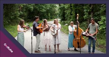 <p>Check out this upbeat and wholesome performance from The Petersens of the song &lsquo;On The Road Again.&rsquo; This bluegrass rendition is absolutely wonderful, and the harmonies sound great. This talented family band is sure to bring a smile to your face and get your toes tapping!</p>

<p>&lsquo;On the road again<br />
I just can't wait to get on the road again<br />
The life I love is making music with my friends<br />
I can't wait to get on the road again&rsquo;</p>

<p>The Petersens&rsquo; version of &lsquo;On The Road Again&rsquo; features lovely harmonies and instruments such as the guitar, mandolin, banjo, dobro, bass, and fiddle. The music video was filmed in a picturesque spot. Many people online shared their thoughts on the performance and their appreciation of the band.</p>

<p>&ldquo;You just keep getting more polished, making music that's more complex, creative, harmonious, interesting, and very delightful,&rdquo; <a href="https://www.youtube.com/watch?v=70Xk-oPQGY4">writes</a> one person on YouTube. &ldquo;This one is very well done.&rdquo;</p>

<p>&ldquo;I can't help but smile and tap my toes along with you all. I love your version of this song! Well done everyone!&rdquo; <a href="https://www.youtube.com/watch?v=70Xk-oPQGY4">comments</a> another person online.</p>

<p>In the <a href="https://www.youtube.com/watch?v=70Xk-oPQGY4">caption</a> of this video, the Petersens share how they now have 900,000 subscribers on YouTube and will be heading out on tour soon. &ldquo;It has been so fun to share this journey with you, and we can't wait to get &lsquo;On the Road Again&rsquo; &ndash; we have shows coming up in Germany, Denmark, the States, and, as ever, our home theater in Branson, Missouri.&rdquo;</p>

<p>As mentioned, The Petersens are a family band from Branson, Missouri, who perform all over. They celebrate American roots music with family values. The band consists of four siblings, Katie, Ellen, Matt, and Julianne, their mom Karen, and good friend Emmett Franz.</p>

<p>We hope that you enjoyed listening to this version of &lsquo;On The Road Again&rsquo; from The Petersens today!</p>
