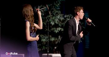 <p>Life in 3D delivers a stunning rendition of &lsquo;The Prayer.&rsquo; I don&rsquo;t know if you&rsquo;ve been watching them as long as I have. When they <a href="https://www.youtube.com/channel/UC6hUJrqT-f4lfKHQ6_gOw2A">sang</a> in their kitchen, raw voices rose like praise between pots and pans, the holy kind of ordinary that made you stop mid-scroll and whisper; this is something special.</p>

<p>I&rsquo;ve watched Daylon and Daura grow up with their brother Devon and have seen glimpses of God-given talent stretch its legs in every new video. From high school halls to college dorms, their voices matured like seasons&mdash;faithful, steady, and anointed.</p>

<p>But this&mdash;this was different.</p>

<p>For the first time, I watched them on an actual stage. Daylon and Daura stood at Mountainview, hearts wide open and voices soaring. Daura, radiant in a midnight-blue sparkly dress that shimmered like stars caught in velvet, and Daylon, sharp in a crisp suit, steady and strong.</p>

<p>Together, they sang &lsquo;The Prayer,&rsquo; and I don&rsquo;t think I breathed the whole time. It wasn&rsquo;t just music&mdash;it was ministry. It was heaven brushing earth. The kind of moment that makes you want to weep for the beauty of it all.</p>

<p>And in that moment, I was reminded again&mdash;God sees. He sees the seeds He plants in us from the very beginning. He waters them with grace, nurtures them through the years, and at just the right time, He lets them bloom to bless the world.</p>

<p>Your gifts? They&rsquo;re not an accident. Your children&rsquo;s talents? Not random. The way you write, bake, teach, sing, comfort, lead, serve&mdash;it&rsquo;s all handcrafted by a God who knows exactly what He&rsquo;s doing.</p>

<p>We don&rsquo;t need to strive to make it big. We just need to be faithful in the small. And when the time is right, He will place you where your voice&mdash;your life&mdash;can echo His glory.</p>

<p><em>&ldquo;A man&rsquo;s gift makes room for him and brings him before the great.&rdquo; <strong><a href="https://www.godtube.com/bible/proverbs/18-16">Proverbs 18:16</a></strong></em></p>
