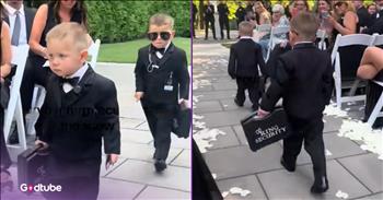 <p>These might be the cutest ring bearers of all time. You&rsquo;ll be cracking up once you get a look at these two children as they make their grand entrance. Watch this short but hilarious clip to see the two adorable young ring bearers.</p>

<p>A wedding ceremony is a big, important moment for every couple. The lives of those individuals standing at the altar in front of their family, friends and God as they vow to remain with one another until death do them part will never be the same after that ceremony. They are no longer two; as the Bible states, they become one.</p>

<p>With so much importance attached to a wedding ceremony, it makes sense that someone would want theirs to be perfect. Because of that, planning a wedding can and does take some time. Every detail, no matter how seemingly small or insignificant, must be thought out, planned for and considered. As a <a href="https://www.tiktok.com/@julianapage/video/7533414671802502430">video posted on social media</a> shows, that even includes the dress and entrance of the ring bearers.</p>

<p>In the clip, the guests are seated, and the ceremony is underway. Members of the wedding party have started making their grand entrance, and it&rsquo;s now time for the ring bearers to walk down the aisle. The two gentlemen, wearing tuxes, carry briefcases with &ldquo;ring security&rdquo; in white lettering. To complete their adorable ring security look, both have ID tags hanging off their suit jackets, and one of them even has on a pair of dark sunglasses.</p>

<p>Those in attendance hoot and holler as the youngsters walk down the aisle, and why not? These two are easily the cutest, most adorable ring bearers you have ever seen.</p>

<p>But to make the video even more hilarious and in keeping with the theme of ring security, the &ldquo;Cops&rdquo; theme song has been added to the short clip as the children enter.</p>

<p><em><strong><a href="https://www.godtube.com/bible/proverbs/17-22">Proverbs 17:22</a></strong> &ldquo;A glad heart makes a healthy body, but a crushed spirit makes the bones dry.&rdquo;</em></p>
