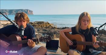 <p>This duo's stunning rendition of James Taylor's classic &lsquo;Carolina in My Mind&rsquo; is a breath of fresh air. It sounds light, flowy, and totally nostalgic. Play the video to listen to it.&nbsp;</p>

<p>British duo Jack and Daisy sing the song in a beautiful setting. They sit on a sandy beach in the sunshine as seagulls fly behind them. Each of them plays an acoustic guitar as they take turns singing and harmonizing. They sing together in a very mellow and classy way. It&rsquo;s a wonderful cover of the James Taylor classic.&nbsp;</p>

<p>Jack and Daisy&rsquo;s cover sounds less folksy and twangy than James Taylor&rsquo;s version, and it&rsquo;s a wholly welcome change. Their cover takes on a more melancholy tone, which seems to give more weight to the lyrics. Some of the words are:</p>

<p>I think I might have heard the highway call<br />
Geese in flight and dogs that bite<br />
And signs that might be omens say I'm going, going<br />
Gone to Carolina in my mind</p>

<p>Their cover makes the lyrics shine. The singer talks about being homesick and leaving everything for Carolina, and that he&rsquo;s already there in his mind. Jack and Daisy each have a sweet voice that sounds wonderful with this song and brings out the emotion of the music.&nbsp;</p>

<p>What&rsquo;s so unique about this cover is its simplicity and wistful sound. The artists don&rsquo;t try to impress you; they simply and slowly sing and strum their guitars in cross-legged fashion. There are no flashy instruments or big production, and the serene setting adds to the ambiance. Though it&rsquo;s a gentle sound, the artists still perform with confidence. The singing duo has truly given new life to an old song. Their version is the kind of song your mind wanders back to in quiet moments long after you hear it.</p>
