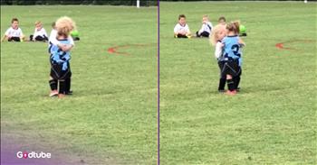 <p>Tiny competitors shared an adorable moment on the playing field. The youngsters were in the middle of a heated, competitive game when they engaged in an unexpected and sweet display of sportsmanship. Watch the short but heartwarming clip to see what the two small children did that will surely be the cutest thing you&rsquo;ll see today.</p>

<p>We&rsquo;re constantly told that competition is good and necessary. When people are forced to compete against one another, their best is always the result. Competition is healthy. The cream always rises to the top. The best person or team will win out in the end.</p>

<p>Those are just some of the clich&eacute;s often heard when someone discusses and comments on competition. But are they true? It would seem that competition frequently brings out the worst in many people&mdash;competitors, coaches and fans. Look at how horribly fans treat one another simply because they support different teams. Players and coaches, when a call doesn&rsquo;t go in their favor, will lose their minds and go berserk on the referees, blaming them if the eventual outcome is a loss. Sportsmanship and simply acting like a decent human being far too often go out the window.&nbsp;</p>

<p>However, <a href="https://x.com/pubitysport/status/1950525787511369747">a clip posted on social media</a> shows two youngsters who shared a sweet and loving embrace in the middle of a soccer game. They exhibited what it means to be a good sport and to be concerned for your fellow competitors.</p>

<p>In the clip, a group of youngsters is kicking around a soccer ball, trying to get it to go in one direction. A little girl wearing a blue uniform attempts to kick the ball downfield, but it doesn&rsquo;t go as planned. Her reaction shows that she&rsquo;s upset that her efforts did not work, and she stops playing immediately. A girl on the other team stops and gives her a warm and loving embrace. She even appears to kiss her on the cheek and then gives her another hug.</p>

<p>What a sweet display that reminds us to keep things in perspective regarding sports and competition.</p>

<p><em><strong><a href="https://www.godtube.com/bible/ephesians/4-32">Ephesians 4:32</a></strong> &ldquo;And be kind to one another, full of pity, having forgiveness for one another, even as God in Christ had forgiveness for you.</em></p>
