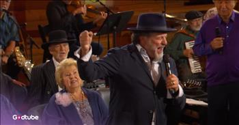 <p>This powerful &ldquo;Jesus Is Coming Soon&rdquo; performance will stir your soul and have you tapping your feet. It&rsquo;s one of the most lively performances you&rsquo;ll ever witness. Play the video to hear the sweet beat.&nbsp;</p>

<p>In a new video, Gaither Music TV features a Nashville barn full of hundreds of people clapping their hands to &ldquo;Jesus is Coming Soon,&rdquo; led by Buddy Mullins. It seems every person in the room has a smile on their face as they sing and look forward to Jesus&rsquo; coming. Some of the lyrics the group belts out are:&nbsp;</p>

<p>Jesus is coming soon, morning or night or noon &nbsp;<br />
Many will meet their doom, trumpets will sound &nbsp;<br />
All of the dead shall rise, righteous meet in the skies &nbsp;<br />
Going where no one dies, heavenward bound</p>

<p>The lead singer has the whole group tapping their feet and swaying to the beat as he energizes them through the song.&nbsp;</p>

<p>&ldquo;Jesus is Coming Soon&rdquo; was made popular by The Sheltons and The Oak Ridge Boys, but it was actually <a href="https://blog.musicscribe.com/2016/01/the-originals-jesus-is-coming-soon/">released</a> in 1942 and written by southern songwriter R.E. Winsett, who is <a href="https://www.hymntime.com/tch/bio/w/i/n/s/winsett_re.htm">said</a> to have written over 1,000 gospel songs. At the time he wrote it, WWII was going on. It certainly makes sense why he would write a song about Jesus&rsquo; coming during that time.&nbsp;</p>

<p>Many singing groups have covered the song over the years. &ldquo;Jesus is Coming Soon&rdquo; won the &ldquo;Song of the Year&rdquo; award in 1969 at the first-ever GMA Dove Awards. R.E. passed away in 1952, 17 years before the song achieved fame.&nbsp;</p>

<p>The song is timeless and speaks truth in its message. When Jesus comes, he will take those who follow him, and like the good book says, he&rsquo;s &ldquo;coming soon.&rdquo;</p>

<p><em>&ldquo;He who testifieth these things saith, Surely I come quickly: Amen. Even so, come, Lord Jesus.&rdquo; <strong><a href="https://www.godtube.com/bible/revelation/22-20">Revelation 22:20</a></strong></em></p>
