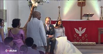 <p>A bride and groom were stunned when their guests broke out into a &quot;Stand by Me&quot; performance. Neither of them had any idea what was happening or why. Watch the short but sweet clip to hear the wedding guests sing &quot;Stand by Me&quot; and see the shocked expressions from the bride and groom.</p>

<p>Weddings are beautiful, life-changing ceremonies. They are the joining together of two people who vow to remain with one another for the rest of their lives, regardless of what life may throw at them. The moments and memories created on a couple&#39;s wedding day will be remembered and looked back upon fondly for years to come. What could be more beautiful than a wedding?</p>

<p>In addition to being beautiful and emotional ceremonies, weddings are often very organized, thoroughly planned and thought-out. Typically, every possible detail and item is meticulously and carefully accounted for and considered. That&#39;s why couples will allow for a year&#39;s gap between getting engaged and getting married. They want every detail to be perfect for their big day, and why not? Weddings are important and should be given the care and thought they deserve.</p>

<p>However, <a href="https://www.youtube.com/watch?v=K_TrPbHyyEI">a clip posted on YouTube</a> shows a special, heartwarming moment that neither the bride nor the groom had planned. In the video, the bride and groom sit at the front of the room when someone unexpectedly stands up and begins singing. The look on the couple&#39;s faces made it abundantly clear that neither of them had the slightest clue about what was happening. But they both went with it, letting the moment happen.</p>

<p>Then, slowly, more guests stood and joined in on the performance. Soon, a handful of guests were singing the beautiful, timeless love song &quot;Stand by Me.&quot;</p>

<p>That is a moment they will remember for the rest of their lives.</p>

<p><em><strong><a href="https://www.godtube.com/bible/genesis/2-24">Genesis 2:24</a></strong> &quot;For this cause will a man go away from his father and his mother and be joined to his wife; and they will be one flesh.&quot;</em></p>
