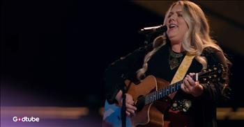 <p>Sometimes a voice slips through the cracks of an ordinary Tuesday night and stills you, right where you are. &nbsp;This Country crooner stuns with The Judds&rsquo; classic &lsquo;Why Not Me&rsquo; on The Voice. She&rsquo;s the kind of voice that feels like church pews and gravel roads, like the warmth of your grandmother&rsquo;s quilt and the edge of a late summer storm. That&rsquo;s what happened when Cori Kennedy walked onto The Voice stage and opened her mouth.</p>

<p>Cori&rsquo;s voice&mdash;low, throaty, honey-smooth with a rasp of gravel&mdash;carried the song like it was stitched into her very bones. You could almost hear Naomi and Wynonna smiling down, because this wasn&rsquo;t just a cover; it was a remembering, a revival. A reminder of what country music sounds like when it&rsquo;s wrapped in both grit and grace.</p>

<p>And just when you thought you&rsquo;d already fallen in love with her, she did something no one expected. She strummed out a playful song she wrote for the judges themselves&mdash;a musical love note that was as much wit as it was wonder:</p>

<p>Well, I&rsquo;m just a girl from a zero-stoplight town&nbsp;<br />
Minnesota roots, wearing hand-me-downs<br />
From dreaming in the dark, I step out and rejoice<br />
My grandma won&rsquo;t believe me that I&rsquo;m singing on The Voice</p>

<p>For Snoop, a nod to his rhythm and rhyme, balanced with her Willie Nelson roots:</p>

<p>Snoop, I didn&rsquo;t grow up to your rhythm or your rhyme<br />
But I know Willie Nelson, so I think we&rsquo;ll be just fine</p>

<p>For Reba, heartfelt thanks for raising her on TV and through red-headed grit:</p>

<p>Miss Reba, you raised me right on the sitcom screen<br />
A single mom working two jobs<br />
My red-head fancy queen&nbsp;</p>

<p>For Nial, a wink at her teenage crush era:</p>

<p>Nail, your happy smile lit up my teenage days<br />
I was only smitten for Harry in my One Direction Phase</p>

<p>For Michael Bubl&eacute;, a laugh-out-loud line about frozen Minnesota cars:</p>

<p>Mr. Bubl&eacute;, you sing like a Christmas star<br />
But have you ever tried to jumpstart a frozen Minnesota car?</p>

<p>It was clever, it was fresh, and it was joy&mdash;pure joy&mdash;wrapped in melody. The kind of moment that makes even jaded judges lean in with grins they can&rsquo;t hide.</p>

<p>But what really lingers is this: Cori&rsquo;s heart. She&rsquo;s the kind of artist who gets us&mdash;she&rsquo;s telling the story of small towns, single moms, teenage crushes, and frozen nights we all know too well. She&rsquo;s the kind of voice that can gather us all around the table and remind us that music, at its best, makes us feel less alone.</p>

<p>One fan <a href="https://www.youtube.com/watch?v=aua8BZEY2Vc">said</a> it best: &ldquo;That rasp. The growl. The high end. Pure country stardom waiting to happen. Love this gal.&rdquo;</p>

<p>Yes. Love this gal. Because when you hear Cori Kennedy sing, you don&rsquo;t just hear music&mdash;you hear possibility. And you can&rsquo;t help but whisper to your friend, &ldquo;Did you see her on The Voice? You have to.&rdquo;</p>

<p><em><strong><a href="https://www.godtube.com/bible/zechariah/4-10">Zechariah 4:10</a></strong> &ldquo;Do not despise these small beginnings, for the Lord rejoices to see the work begin.&rdquo;</em></p>
