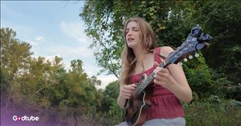 <p>Listen to this beautiful makeover of the song &lsquo;Ring of Fire&rsquo; by Johnny Cash. The singer in the video is Julianne Petersen, a member of the talented family band known as The Petersens. During her cover of &lsquo;Ring of Fire&rsquo;, Julianne is playing the mandolin, and her beautiful voice and range really shines with this music.</p>

<p>&lsquo;Love is a burning thing and it makes a fiery ring<br />
Bound by wild desire, I fell into a ring of fire&rsquo;</p>

<p>&ldquo;I&rsquo;ve been wanting to cover this Johnny Cash song ever since it got stuck in my head a few months ago, and I&rsquo;m so excited to finally share it with you!&rdquo; Julianne shares in the caption of her video.</p>

<p>This is such a stunning presentation of this classic Johnny Cash song. Many people online shared their praise for Julianne&rsquo;s musical performance.</p>

<p>&ldquo;Wow, Julianne, your music doesn&rsquo;t just sound beautiful, it feels beautiful! And with this performance you just proved that simplicity can be the loudest beauty of all! You&rsquo;ve got that rare magic where less truly becomes more. From the first note to the last breath, that heavenly beauty in your voice when you sing, well, that&rsquo;s pure emotion!&rdquo; <a href="https://www.youtube.com/watch?v=PiwlGgQu13M">comments</a> one person on YouTube after watching the video.</p>

<p>&ldquo;That is the most beautiful version of this song I've ever heard! You have an extraordinary and unique voice and amazing range. Thank you so much! Brilliant!&rdquo; <a href="https://www.youtube.com/watch?v=PiwlGgQu13M">writes</a> another person online.</p>

<p>When it comes to the history of &lsquo;Ring of Fire&rsquo; by Johnny Cash, the song was written by June Carter and Merle Kilgore. It was initially recorded as &lsquo;(Love's) Ring of Fire&rsquo; by June's sister, Anita Carter. The song became popular after Johnny Cash recorded it, and it appeared on his 1963 compilation album titled Ring of Fire: The Best of Johnny Cash.</p>

<p>We hope you enjoyed listening to Julianne Petersen&rsquo;s rendition of &lsquo;Ring of Fire&rsquo; today!<br />
&nbsp;</p>
