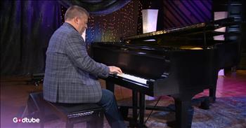 <p>Listen to this peaceful piano version of the song &lsquo;There&rsquo;s Something About That Name.&rsquo; Matthew Holt is the musician performing the hymn on the piano in this video. May this song uplift you and soothe your soul today!</p>

<p>&lsquo;Jesus, Jesus, Jesus; there's just something about that name.<br />
Master, Savior, Jesus, like the fragrance after the rain;<br />
Jesus, Jesus, Jesus, let all Heaven and earth proclaim<br />
Kings and kingdoms will all pass away, but there's something about that name.&rsquo;</p>

<p>The song &lsquo;There&rsquo;s Something About That Name&rsquo; was written in 1970 by Bill and Gloria Gaither. Gloria says the song came to them out of a personal experience that confirmed the power and effect the name of Jesus had on their everyday lives. There really is something so special about the name of Jesus. No wonder so many songs and hymns have been written about His name!</p>

<p>Matthew Holt has had a full career, utilizing his musical talents. In 2004, he joined the award-winning family group The Perrys and played with them until 2008. Then in 2012, Matthew became the full-time keyboard player for the Gaither Vocal Band and the Gaither Homecoming Tour. In addition to his work as a full-time touring musician for the Gaither tour, Matthew serves as Executive Director of Bethel University&rsquo;s Renaissance program in Tennessee, supporting up-and-coming artists.</p>

<p>Many people online shared their thoughts about Matthew&rsquo;s piano performance of &lsquo;There&rsquo;s Something About That Name.&rsquo;&nbsp;</p>

<p>&ldquo;Such beautiful worship music that leads my heart to God&rsquo;s throne. Thank you,&rdquo; <a href="https://www.youtube.com/watch?v=upTKvdDK35s">comments</a> one person online after watching the video.</p>

<p>&ldquo;Love it, love it! I close my eyes and I'm in heaven,&rdquo; <a href="https://www.youtube.com/watch?v=upTKvdDK35s">writes</a> another person.</p>

<p>We hope that you enjoyed listening to this instrumental version of the hymn &lsquo;There&rsquo;s Something About That Name&rsquo; from Matthew Holt today, and may it be an encouragement for you!</p>
