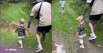 <p>This little one could not resist a nearby puddle. Despite the youngster&rsquo;s father telling him otherwise, the temptation of the puddle was just too great. Watch the short but unbelievably cute video to see the little guy ignore his father&rsquo;s directives and hop right into the puddle.</p>

<p>Children are an absolute blessing, and no decent person would argue otherwise. Those youngsters bring with them an innumerable amount of happiness and joy to every household. Every parent and grandparent would agree that children make life better in every way imaginable.</p>

<p>While being a parent is the greatest blessing that anyone can experience on this Earth, not every moment will be one to remember or cherish. Children will test and try your patience and nerves, seemingly on an ongoing, never-ending basis. They all know which of your buttons to push, trying to see how far you&rsquo;ll let them go before reacting negatively, if you&rsquo;ll really hold to what you said. Children testing boundaries is a part of childhood that every parent knows all too well.</p>

<p><a href="https://www.youtube.com/shorts/MHLjLAeED_k">In a clip posted on YouTube</a>, a young man was captured testing his boundary and then completely disregarding it once he reached it. The young man and his father were on a walk through the woods, with dad holding onto the little guy&rsquo;s hand for obvious reasons. A few feet ahead of the father and son is a little girl, an older sibling. She is leading the way, as older brothers and sisters tend to do.</p>

<p>However, as the young man and his father are walking through the woods, they come upon a messy, very muddy puddle. The father makes a concerted effort to avoid the puddle, going as far to the right of the mess as possible. As he does, he makes sure to inform the young man to stay out of the puddle.</p>

<p>&ldquo;We don&rsquo;t want to get all wet in the middle of our walk,&rdquo; the father tells the youngster.</p>

<p>But, of course, his father&rsquo;s words went in one ear and out the other. Once the child spots the puddle, he doesn&rsquo;t take his eyes off of it, and immediately after his dad told him not to, he walks right into the puddle and falls.</p>

<p>Sometimes, puddles are just too much fun!</p>

<p><em><strong><a href="https://www.godtube.com/bible/proverbs/22-6">Proverbs 22:6</a></strong> &ldquo;If a child is trained up in the right way, even when he is old, he will not be turned away from it.&rdquo;</em></p>
